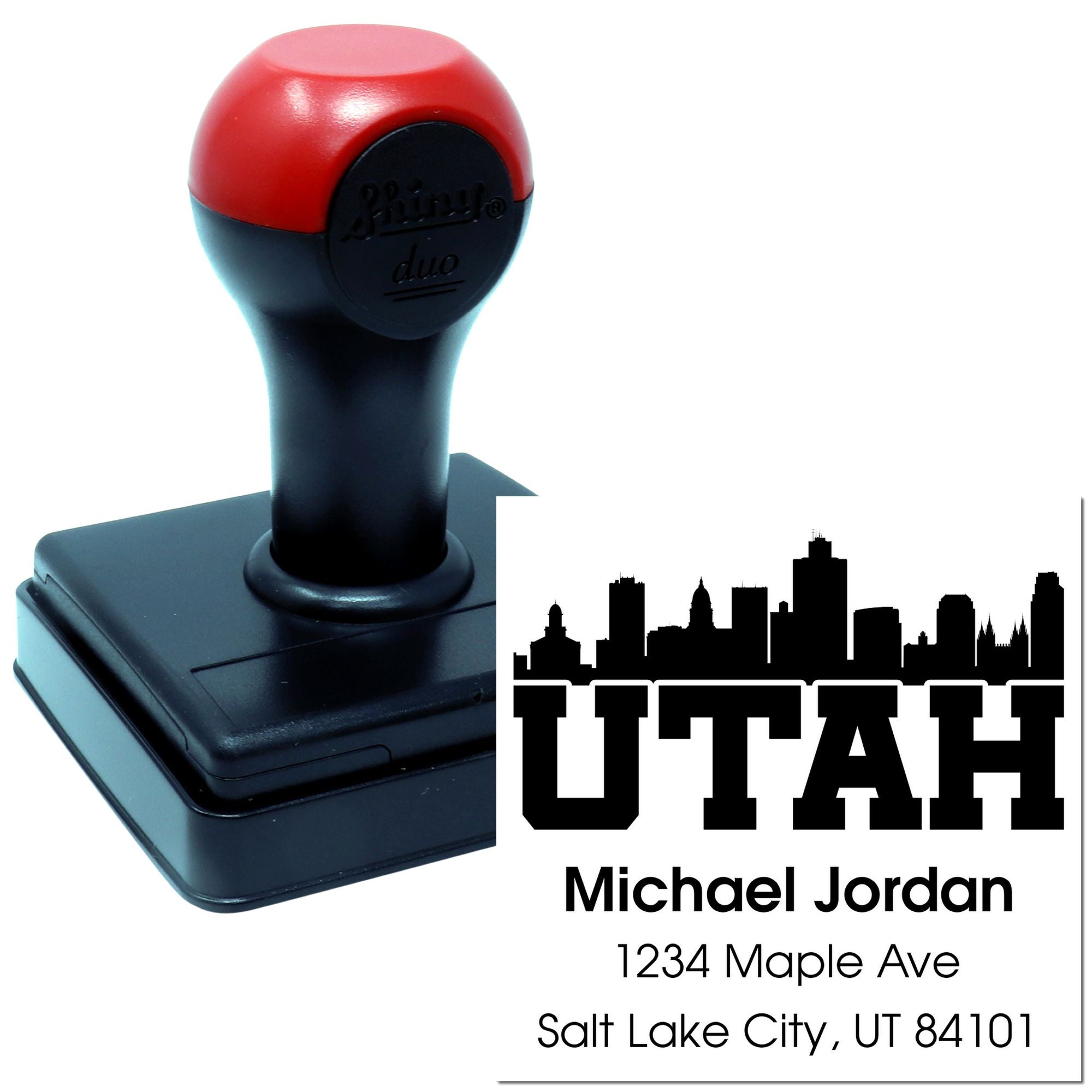 Custom self-inking rubber address stamp for Utah, featuring a skyline design with personalized name and address.