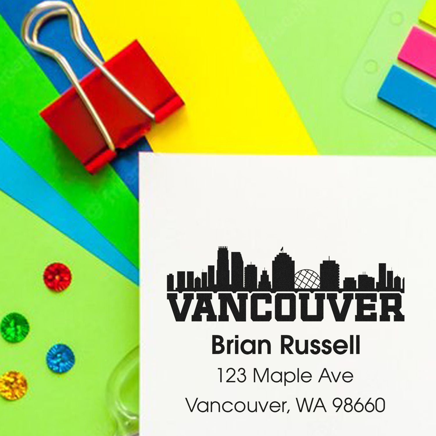 Custom rubber address stamp with Vancouver skyline, personalized return address for Brian Russell, 123 Maple Ave, Vancouver WA 98660.