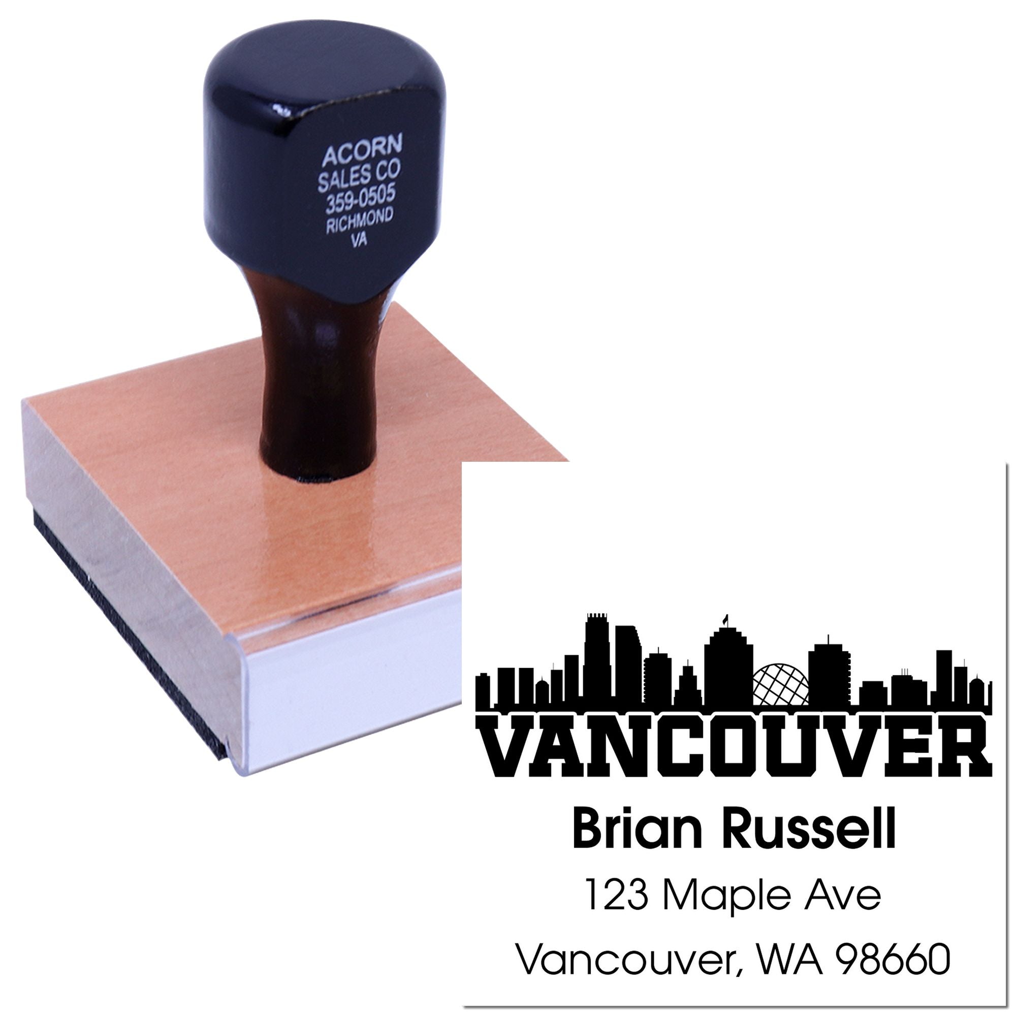 Custom address rubber stamp with Vancouver skyline logo for personalized business mailings and return addresses.