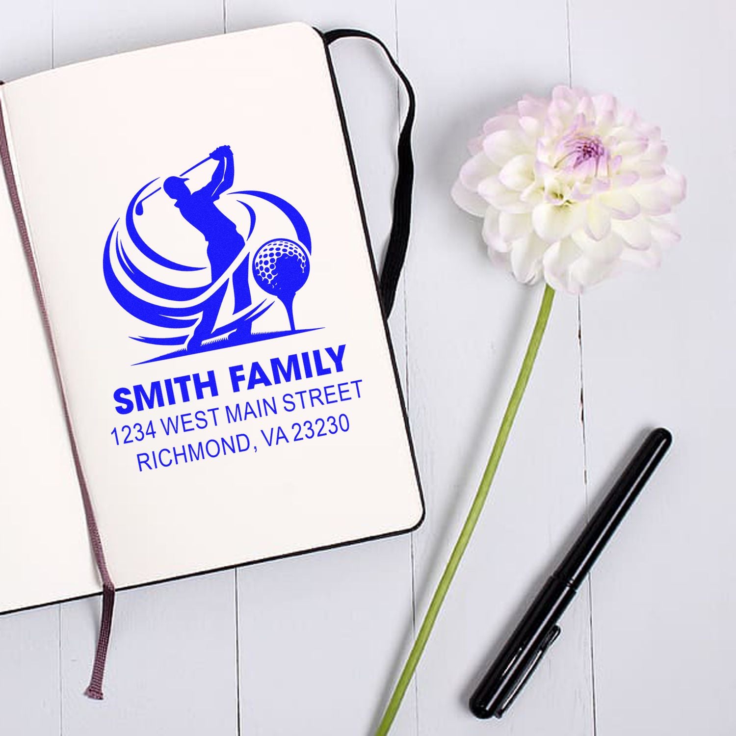 Custom rubber stamp sample with Smith Family golf logo and return address for personalized mailing.