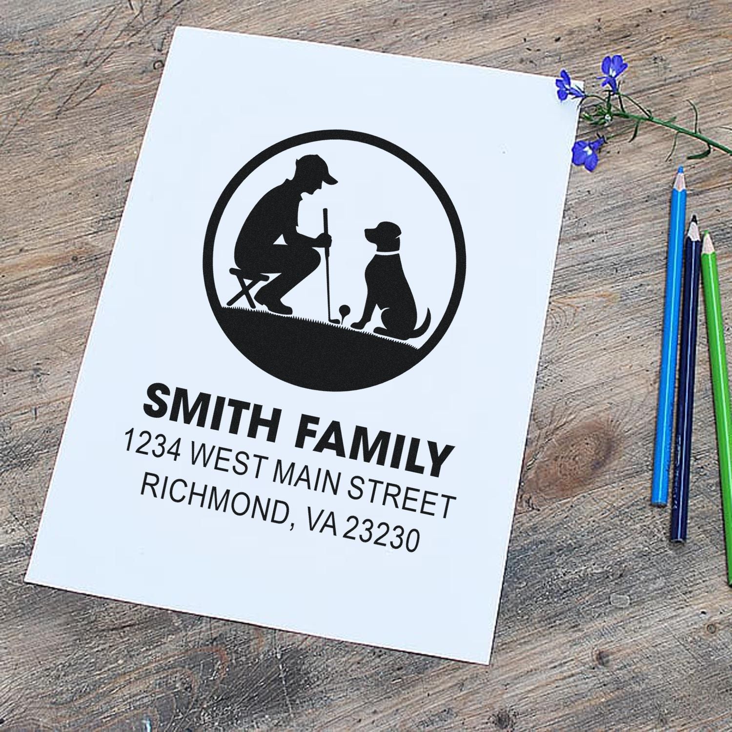 Custom rubber stamp with family return address and dog silhouette for personalized mail, stationery, and gifts.