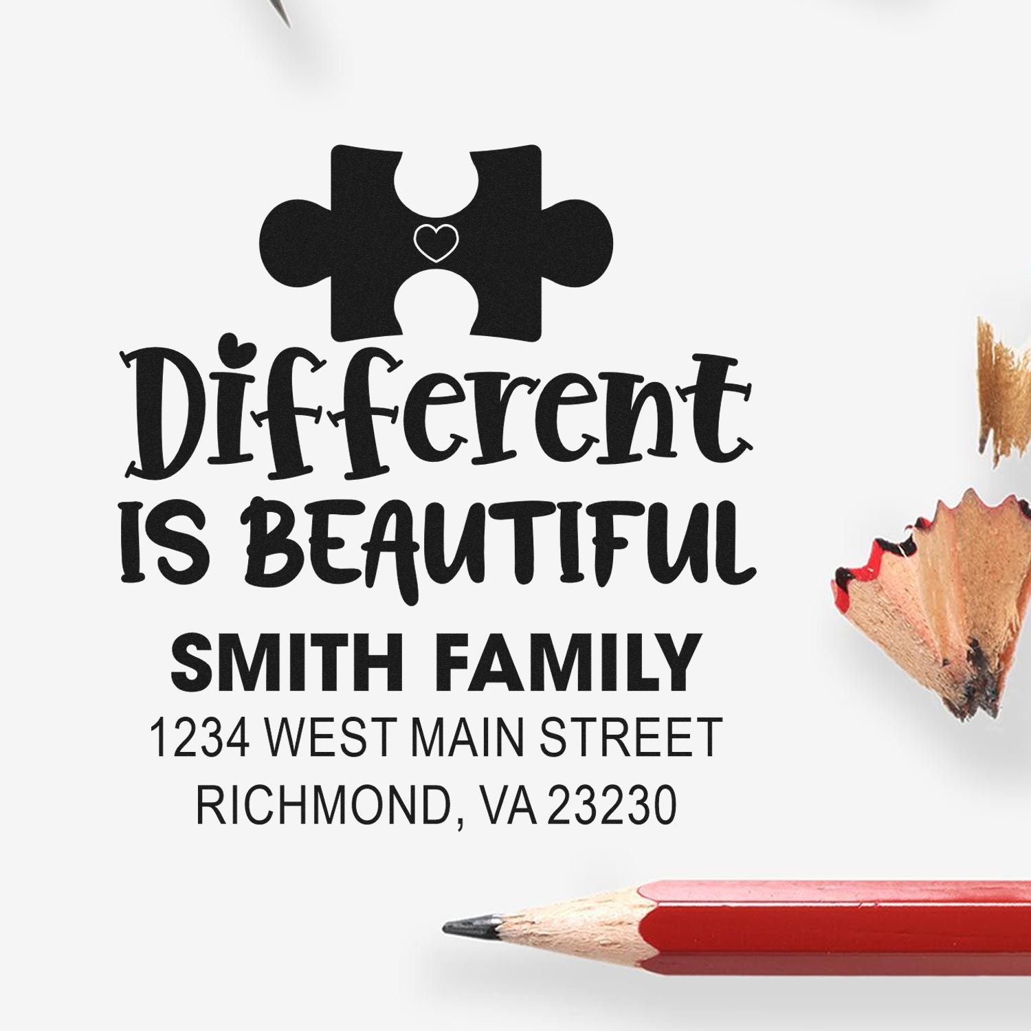Custom Smith family return address rubber stamp with puzzle-piece heart and Different Is Beautiful slogan.
