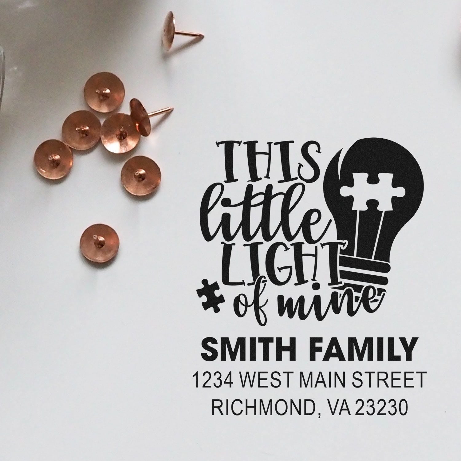Custom return address rubber stamp with This Little Light of Mine light bulb design, Smith family name, and Richmond, VA address.