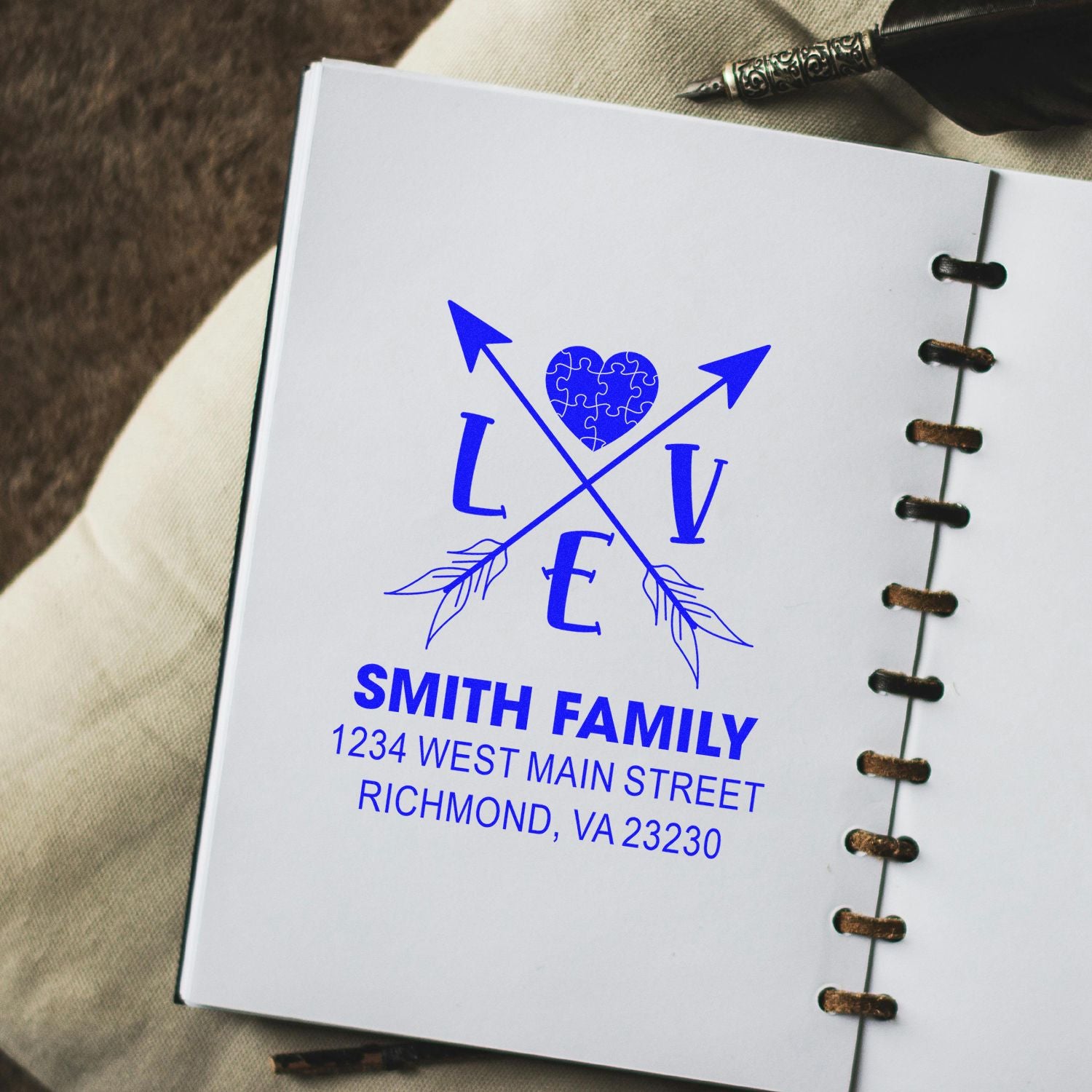 Custom Smith Family return address rubber stamp with monogram heart and arrows for personalized stationery.