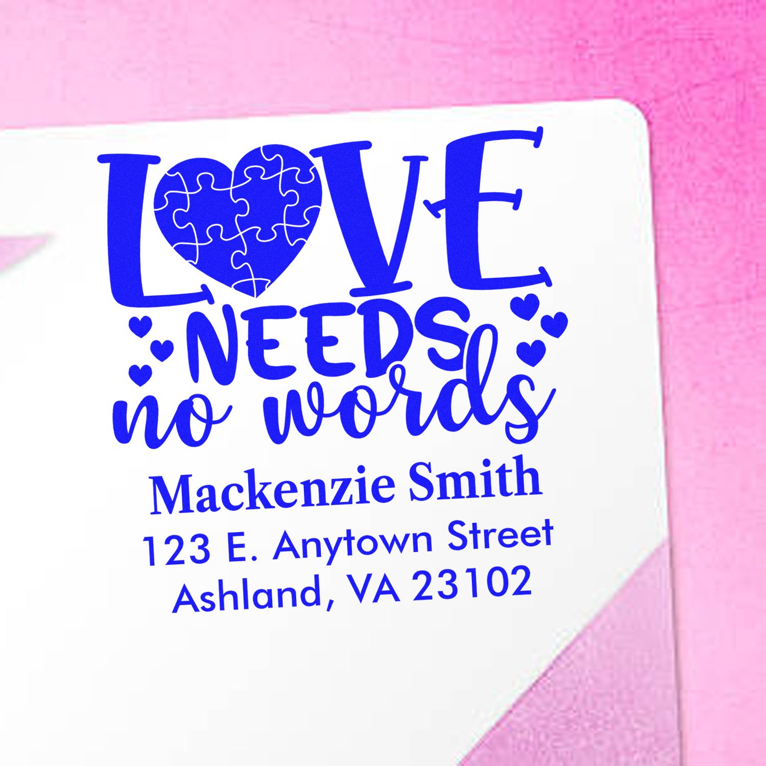 Personalized rubber address stamp design with Love Needs No Words puzzle heart for wedding or romance envelopes.