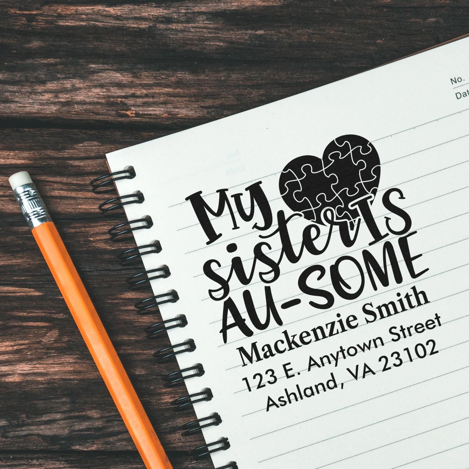 Personalized rubber stamp for sisters with heart puzzle graphic and custom return address design.