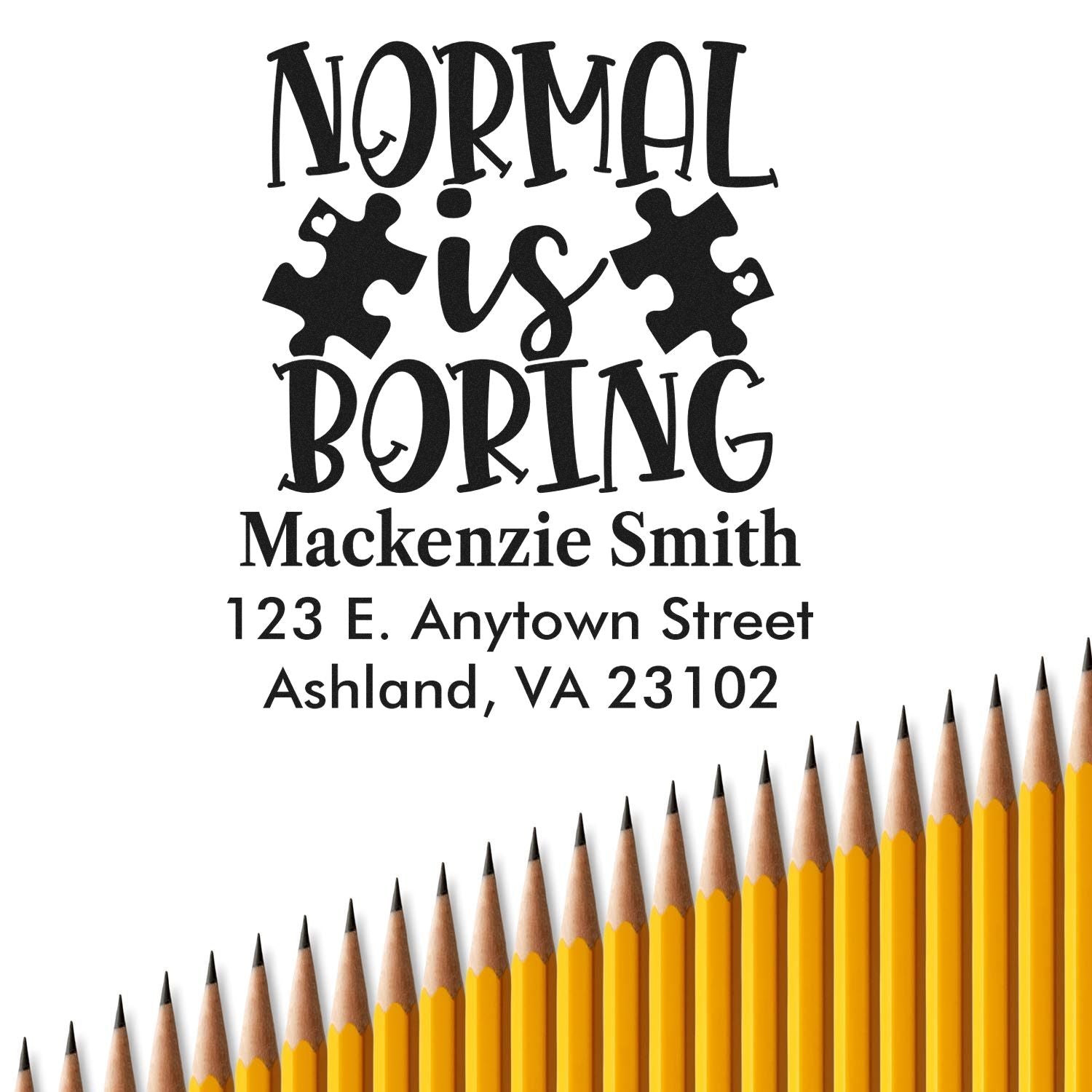 Custom rubber stamp design with Normal Is Boring, puzzle pieces, name and address for personalized school or craft stamping.