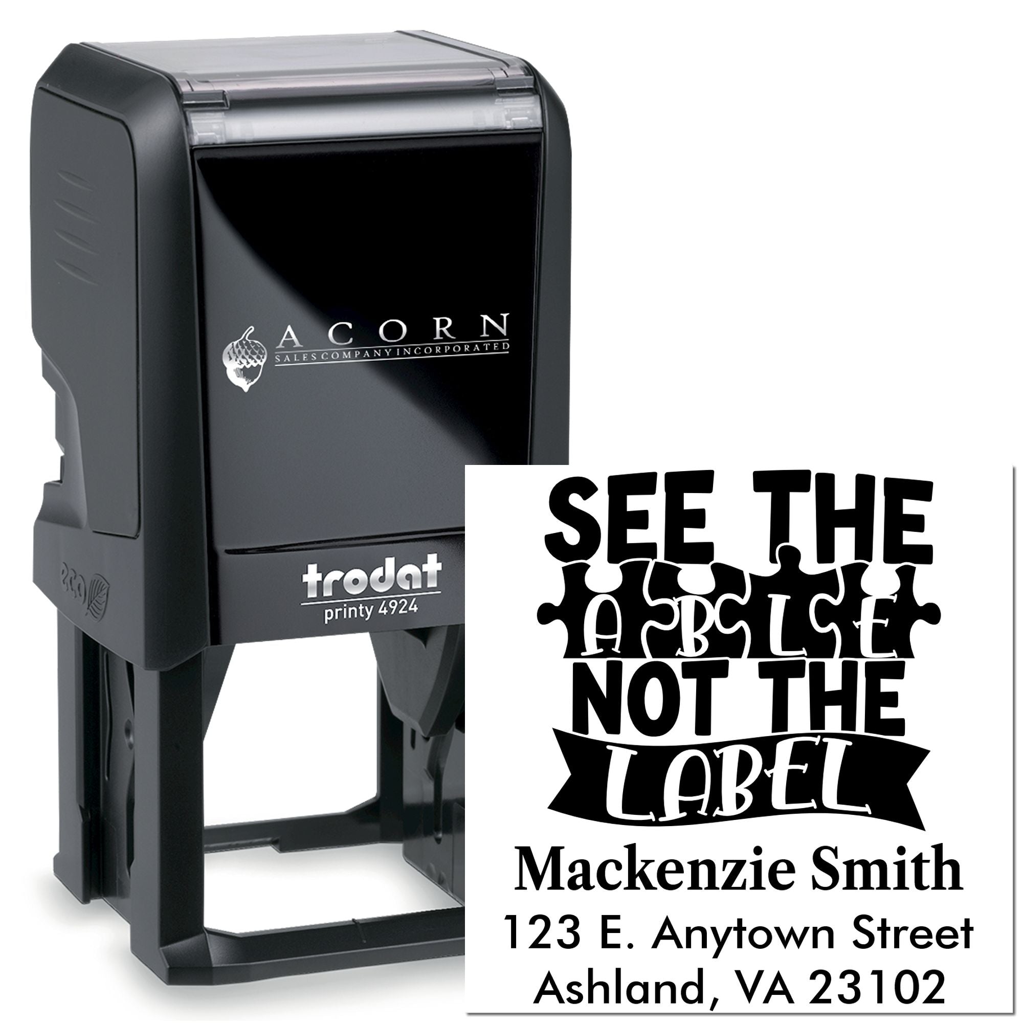 Custom Trodat self-inking rubber stamp with label design, name, and address for Mackenzie Smith business branding.