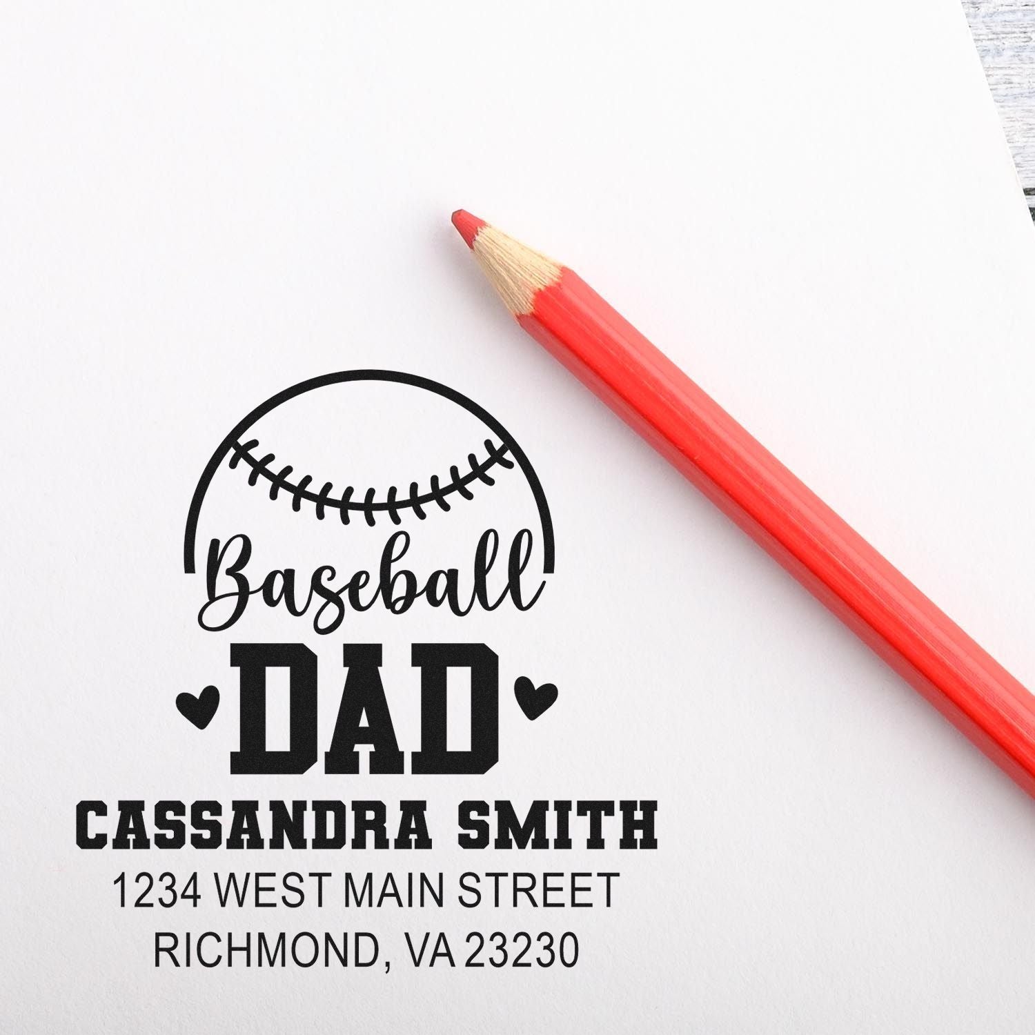 Custom personalized baseball dad rubber stamp with name and address, displayed on white paper beside a red pencil mockup.
