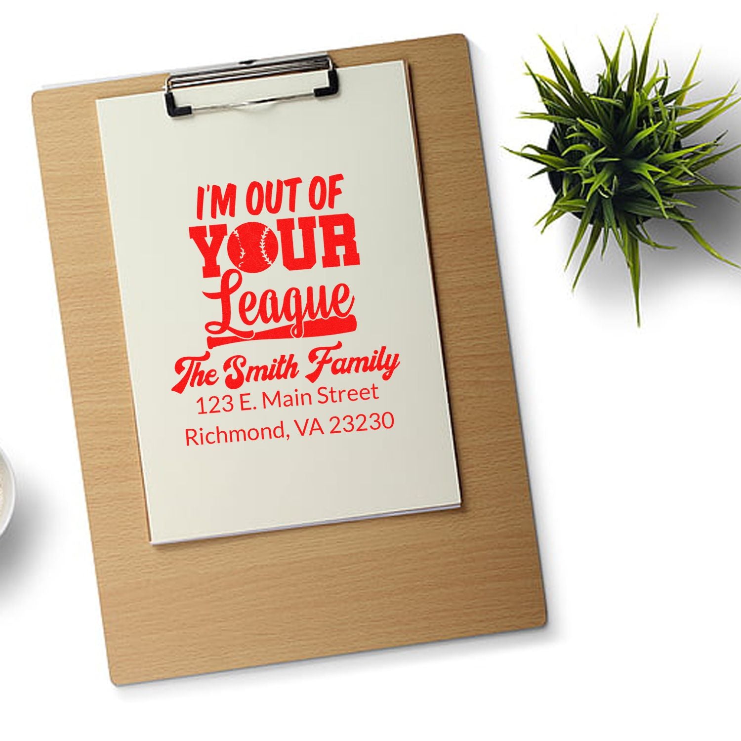 Custom baseball-themed rubber stamp design with family name and address for personalized mailing.