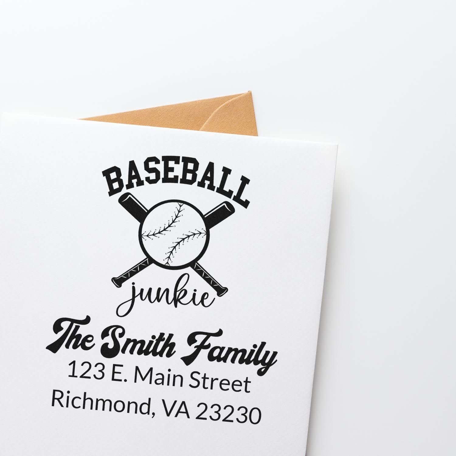 Custom baseball junkie return address rubber stamp with family name for personalized envelopes and sports-themed mail.