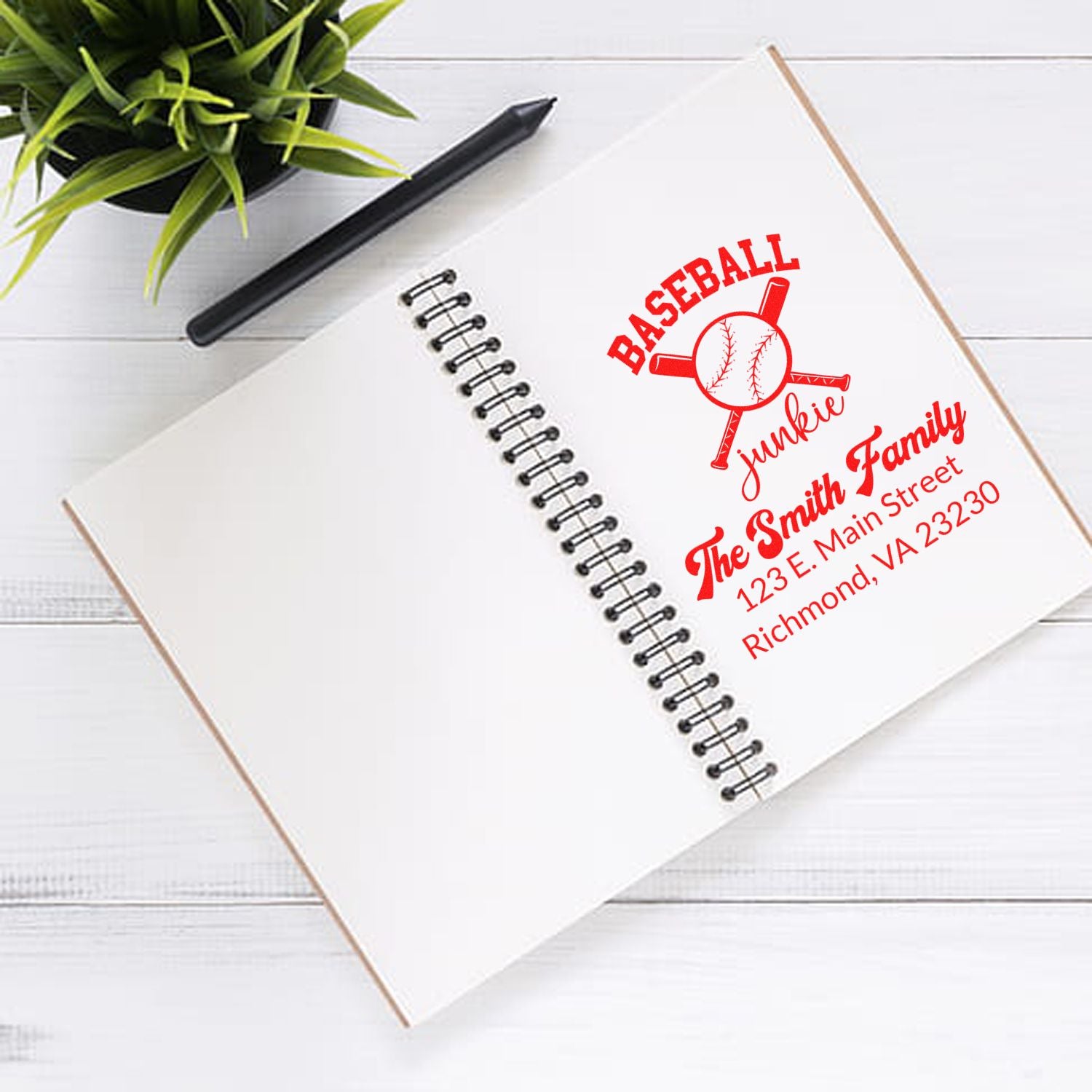 Custom baseball family return address rubber stamp on notebook page, featuring The Smith Family and Richmond, VA address.