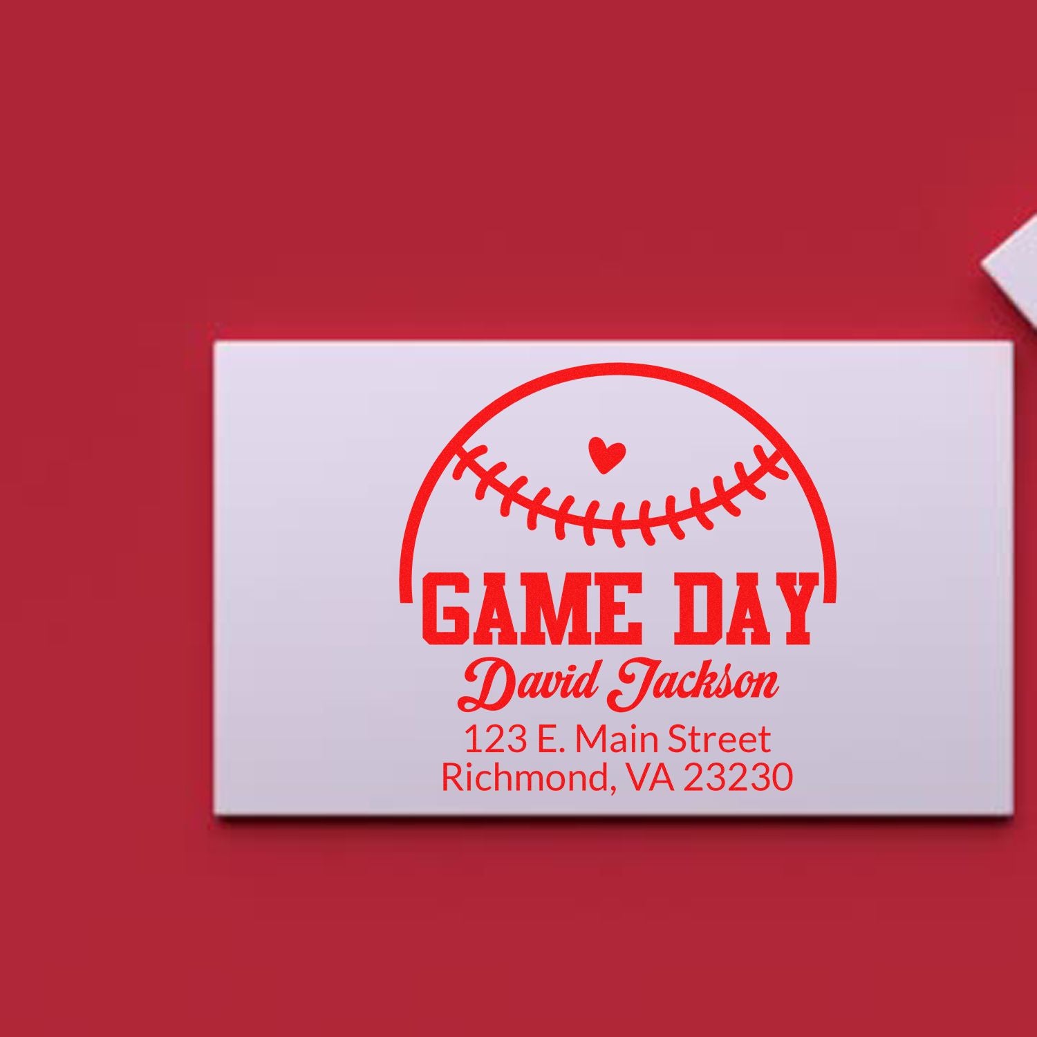 Custom baseball game day rubber stamp with personalized name and address, featuring a stitched ball heart design for sports stationery