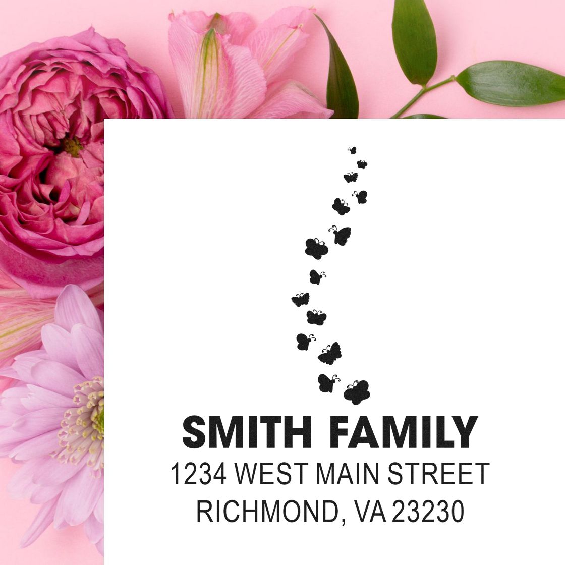 Personalized butterfly address rubber stamp for Smith Family, featuring name and Richmond, VA return address.