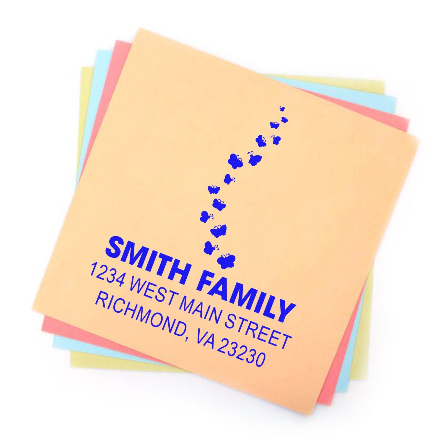 Custom rubber address stamp design for Smith Family with butterfly motif and Richmond, VA return address on stationery.