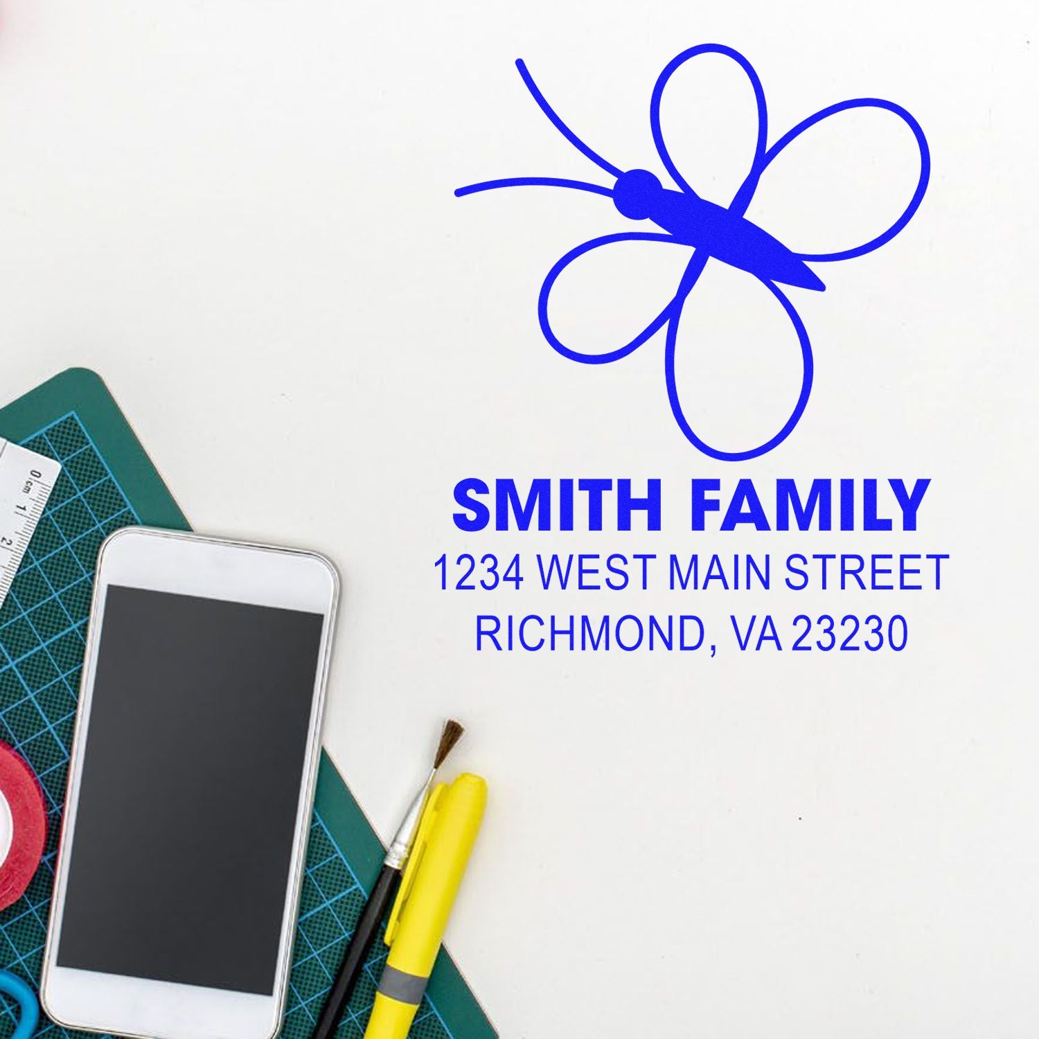 Custom butterfly address rubber stamp for Smith Family, 1234 West Main Street, Richmond, VA 23230.