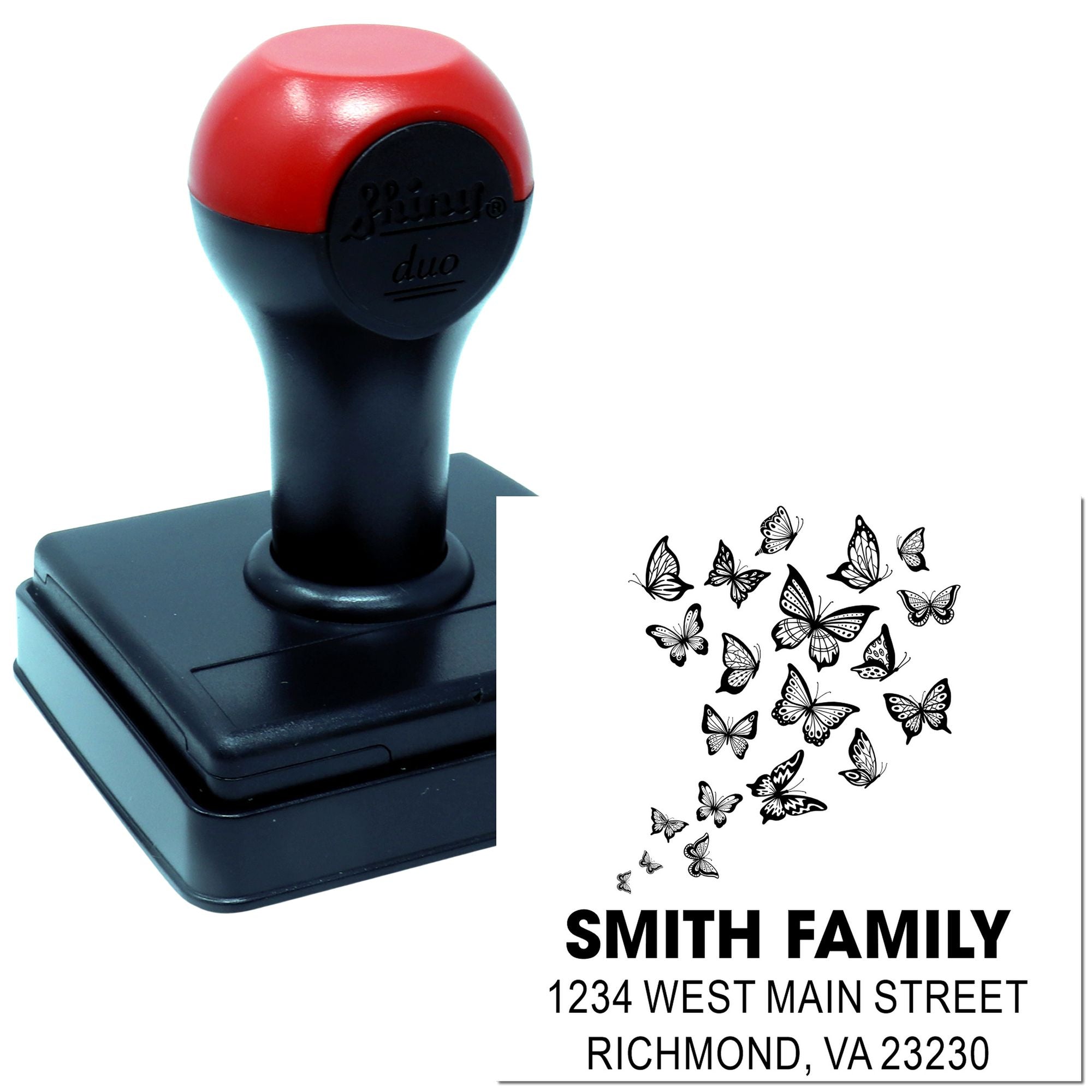 Custom self-inking rubber address stamp with butterfly design for personalized family mailings and return addresses.