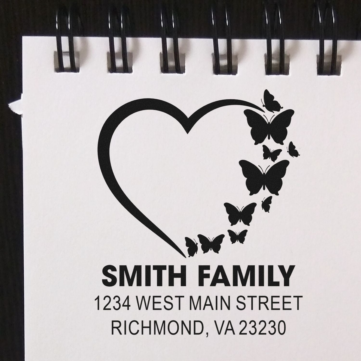 Custom butterfly heart return address rubber stamp for Smith Family, featuring personalized name and Richmond, VA address.