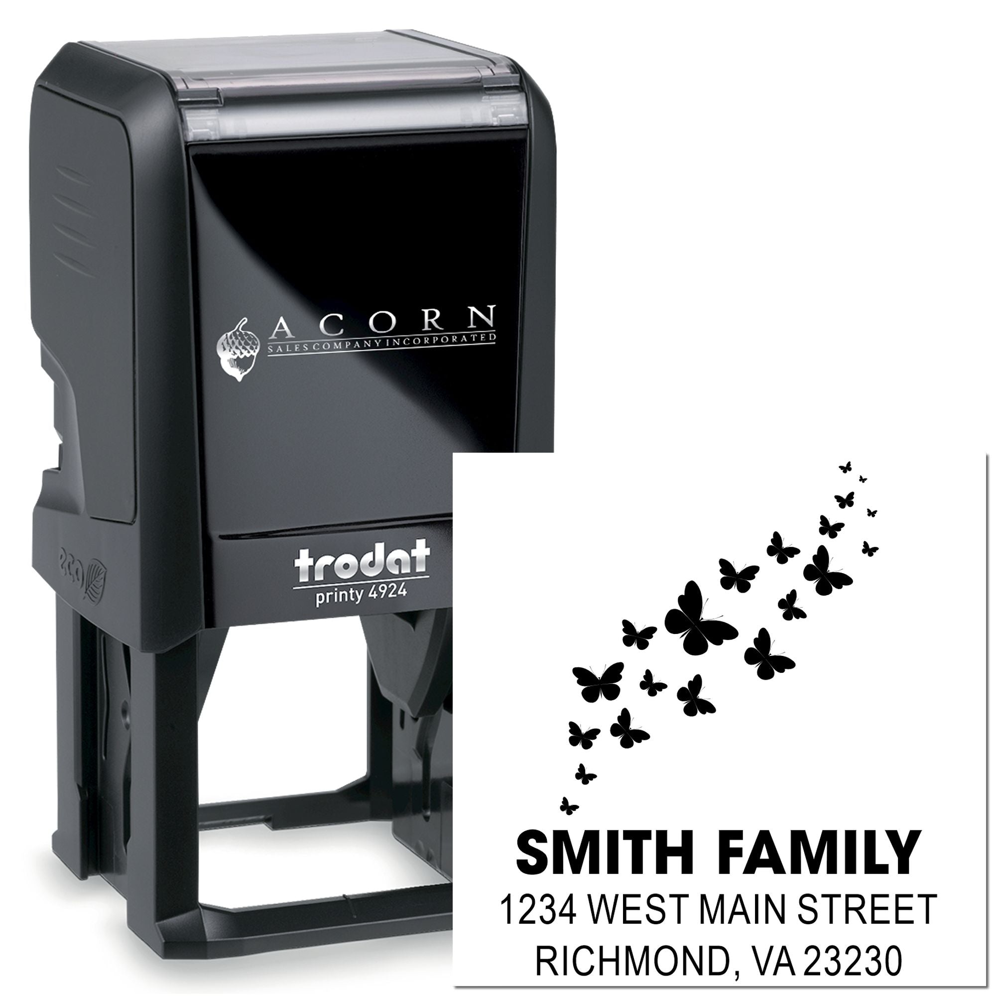 Trodat self-inking rubber address stamp with butterfly design and Smith family return address.
