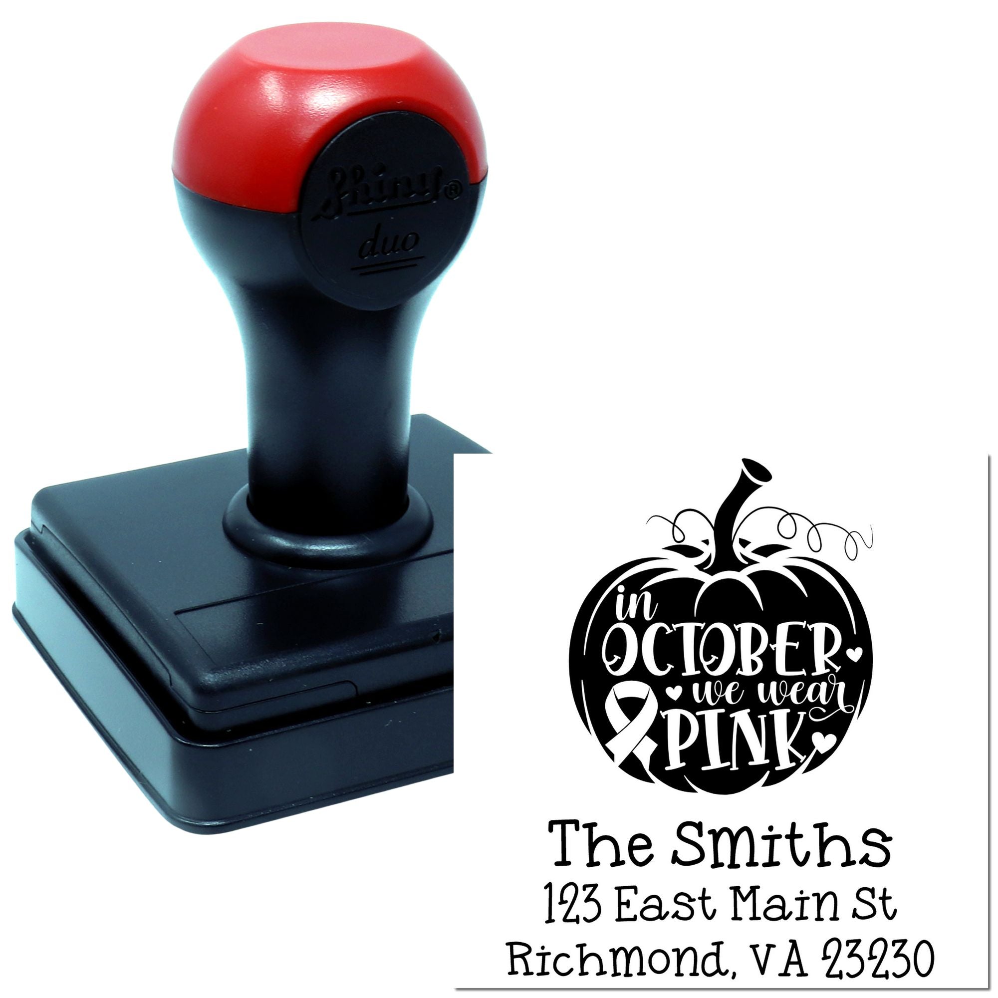 Custom self-inking rubber stamp featuring a pumpkin In October We Wear Pink breast cancer awareness design and personalized address.