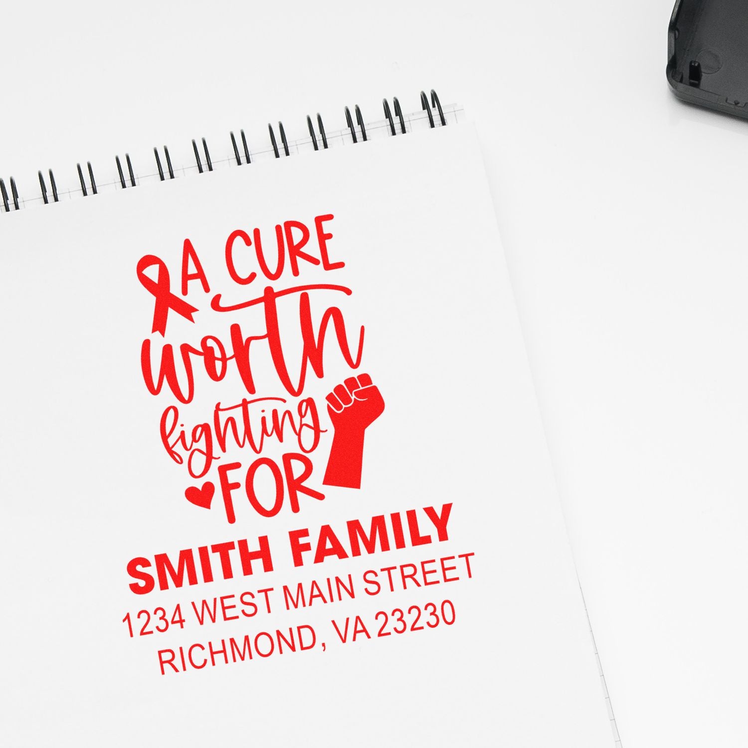 Custom breast cancer awareness rubber stamp with A Cure Worth Fighting For and personalized Smith family address.
