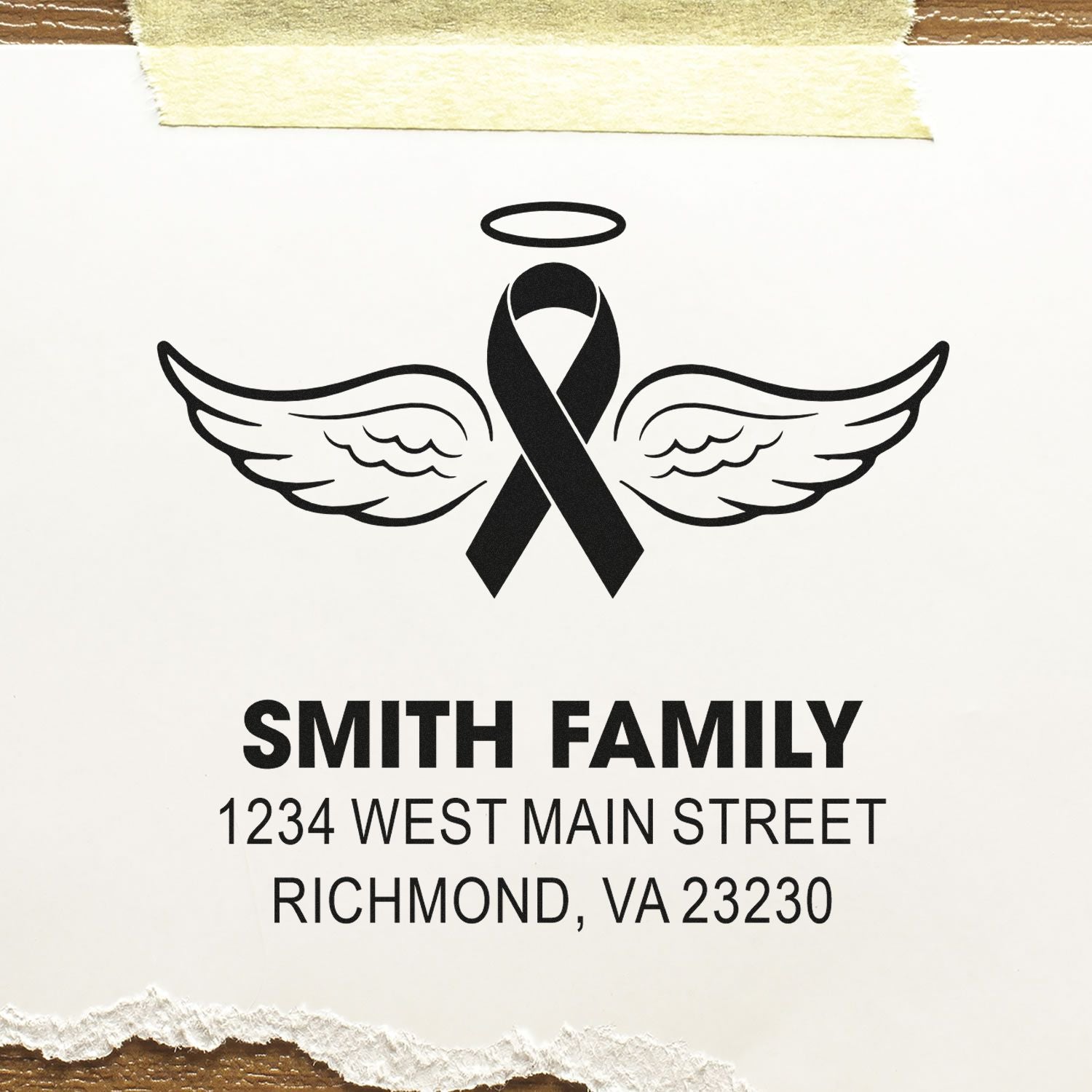 Custom memorial rubber stamp with angel wings, ribbon, and Smith Family return address in Richmond, VA.