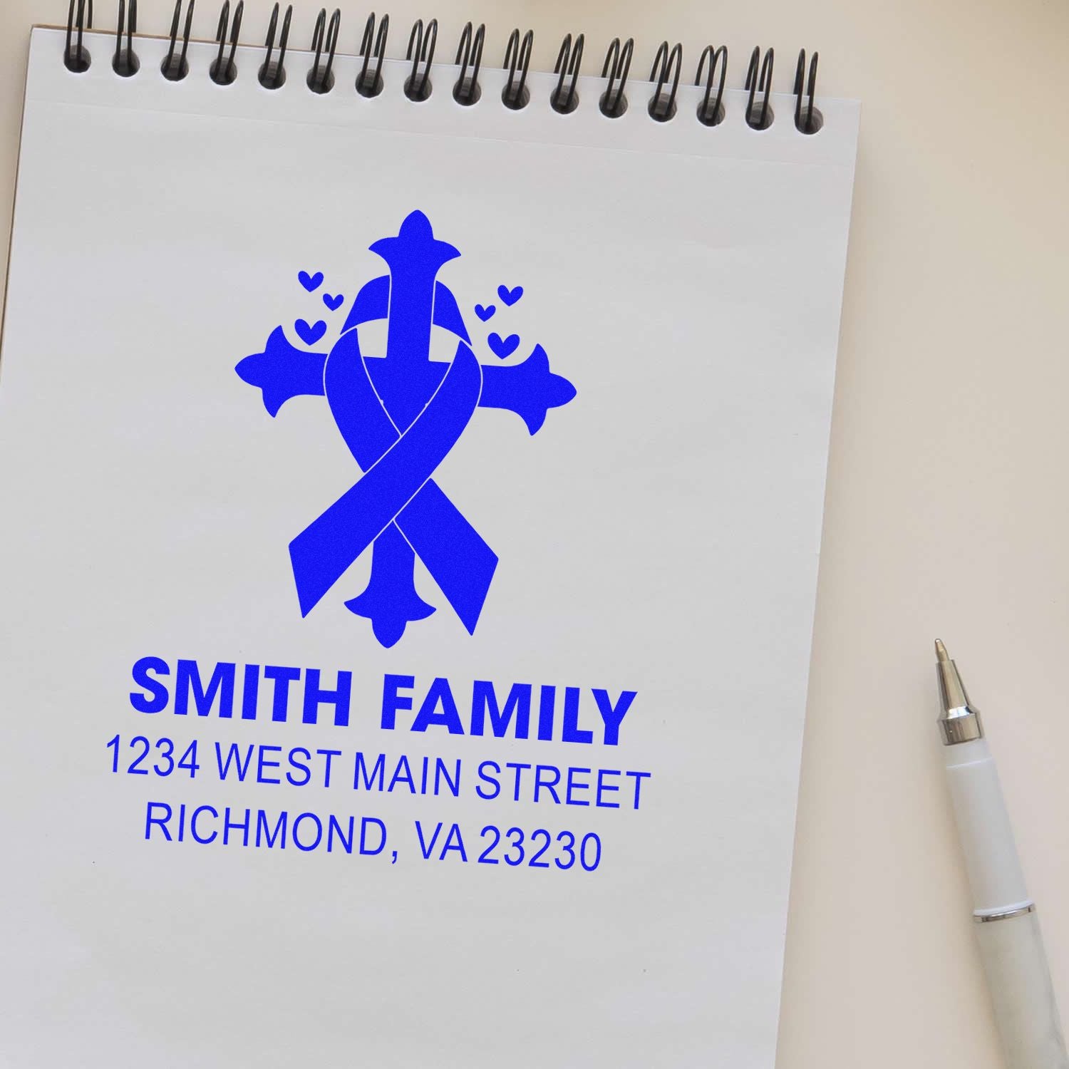 Custom address rubber stamp with blue ribbon, Smith Family name, and Richmond, VA return address.