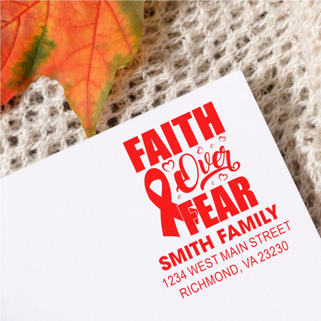 Custom Faith Over Fear Smith Family return address rubber stamp impression in red on paper.