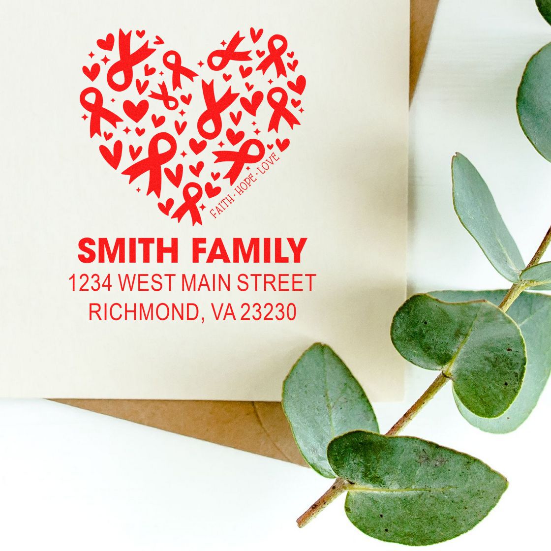 Custom rubber stamp with heart ribbon design, Smith Family return address, and personalized red stationery for awareness or wedding mailings.