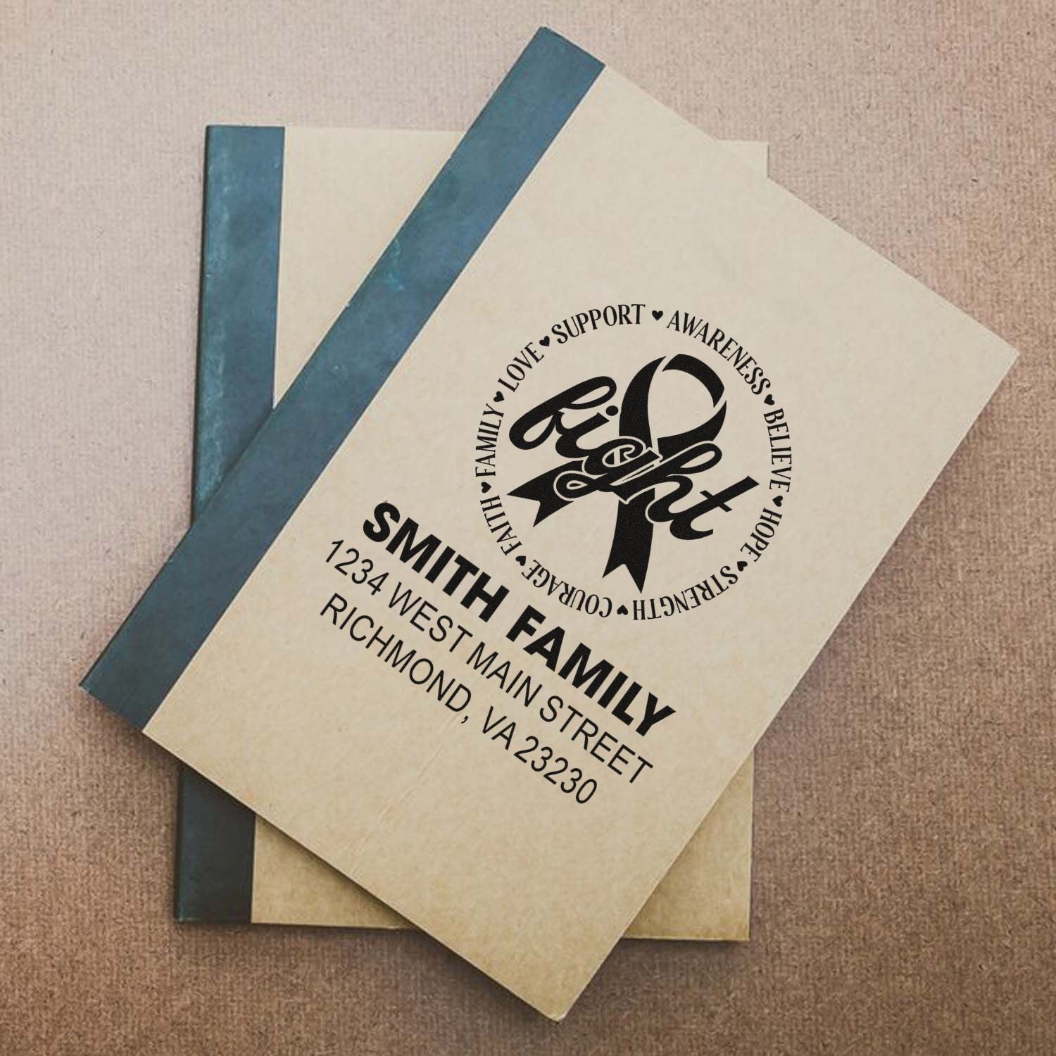 Custom Smith Family address stamp with awareness ribbon design for personalized envelopes and fundraising mailings.