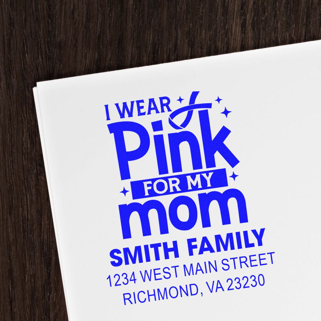 Custom rubber stamp for Mom with family name and Richmond address, featuring I Wear Pink for My Mom in blue ink.