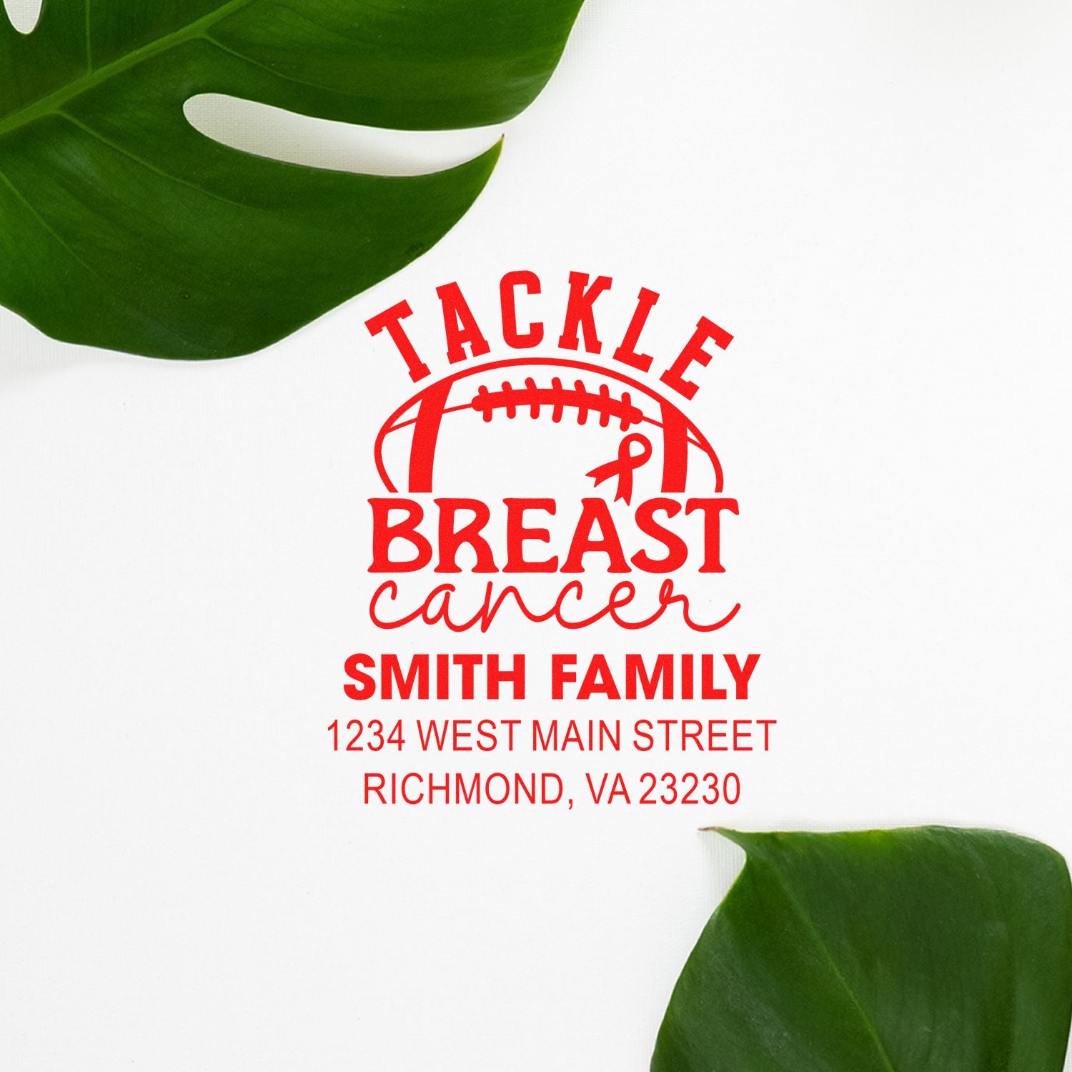 Custom breast cancer awareness rubber stamp featuring football art and Smith Family return address.