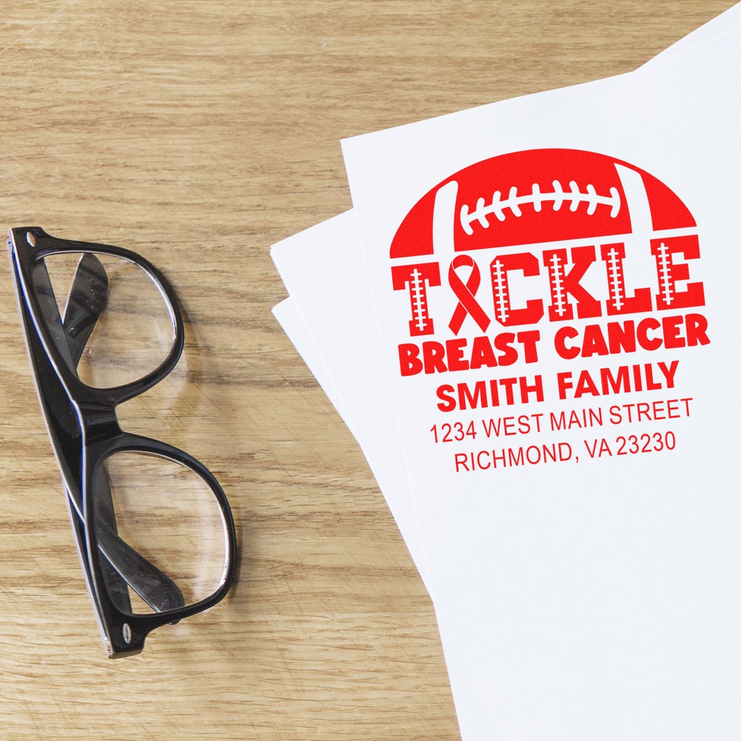 Custom rubber stamp design: football-themed Tackle Breast Cancer return address for the Smith family.