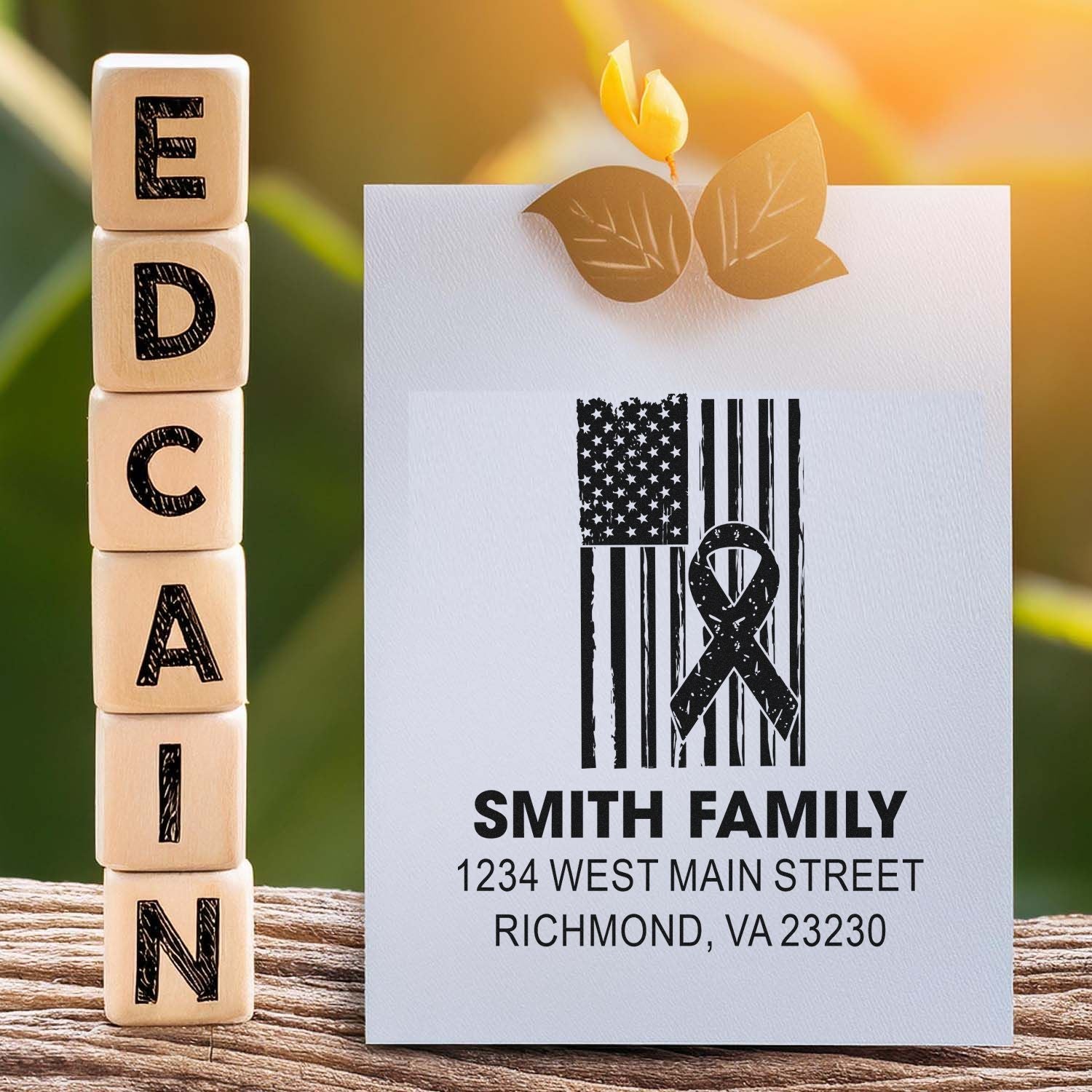 Custom family address rubber stamp with patriotic ribbon design for personalized mail, stationery, and wedding invitations.