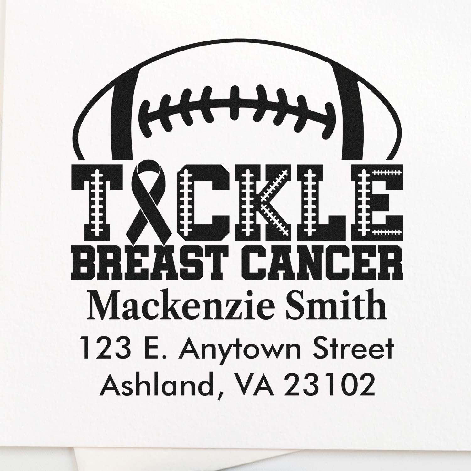 Custom breast cancer awareness rubber stamp with football graphic, Tackle Breast Cancer message, and name and address.