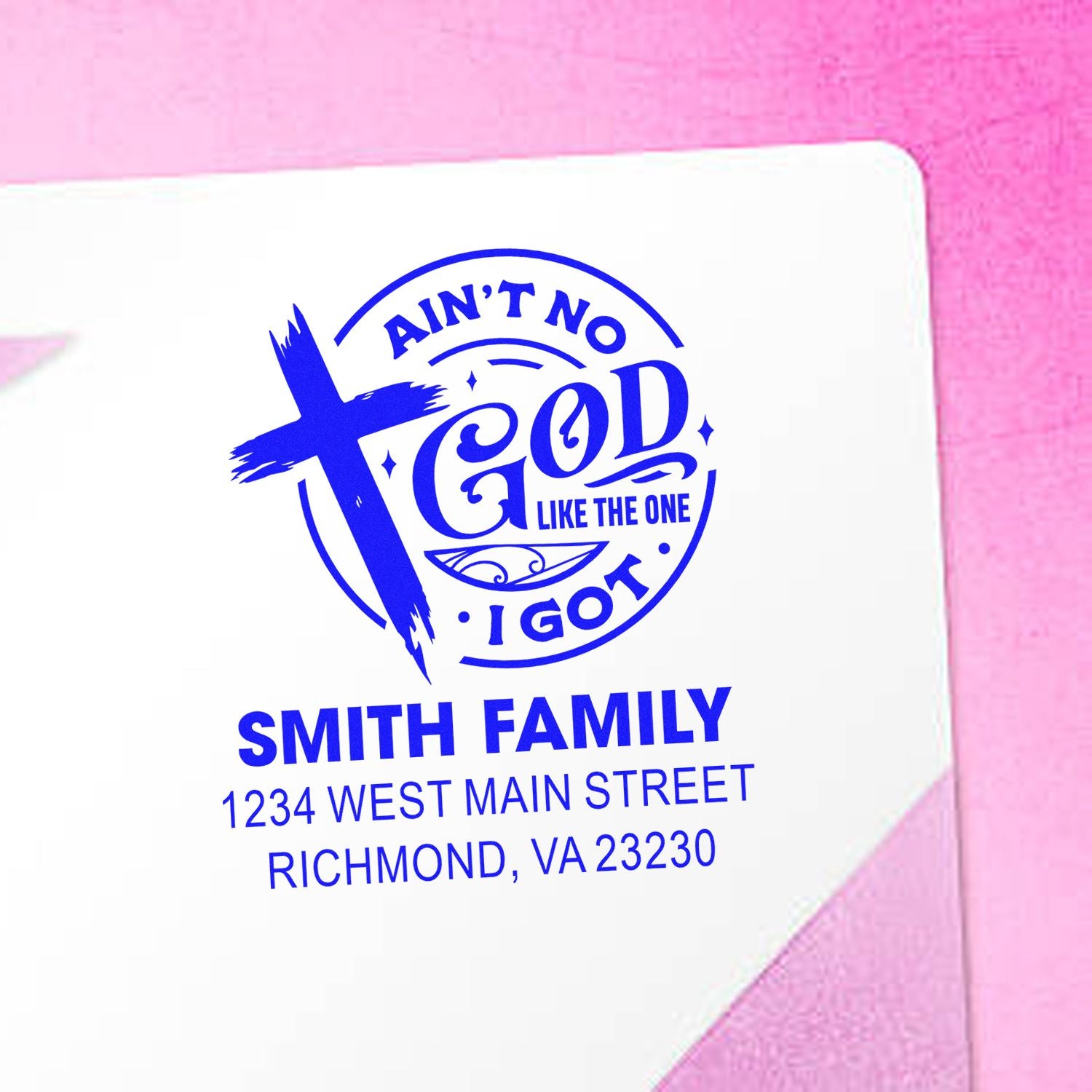 Custom Christian rubber stamp with Aint No God Like the One I Got design and Smith Family return address in blue ink.
