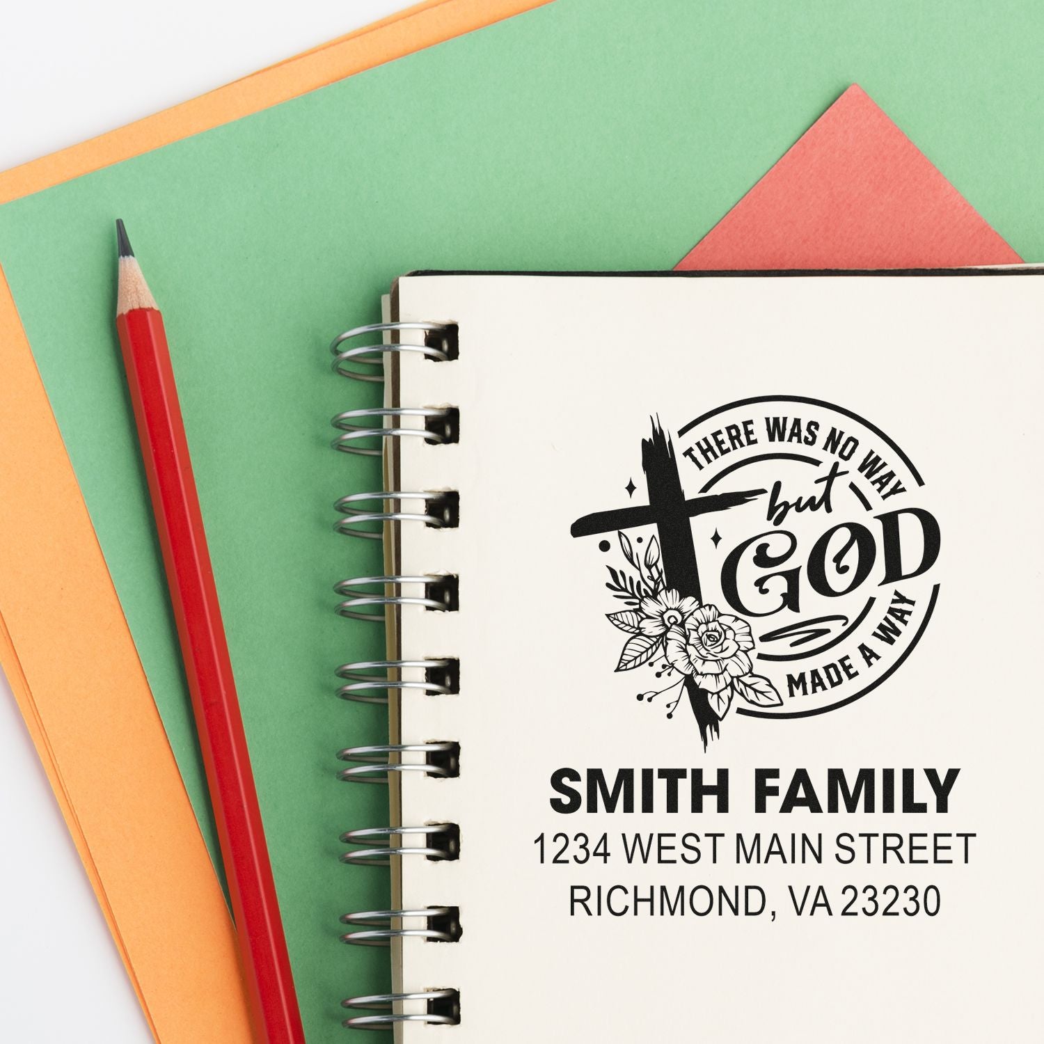 Personalized family return address rubber stamp with Christian cross and floral design for custom stationery.