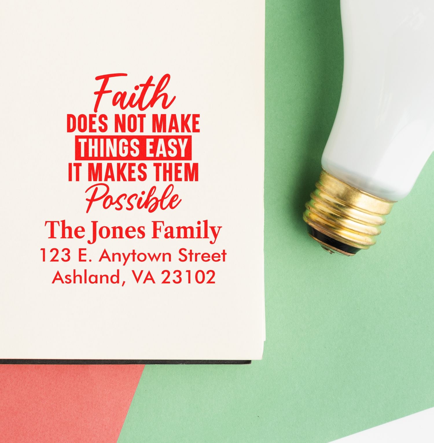 Custom rubber stamp with faith quote and family return address, shown beside a stamped impression for personalized stationery.