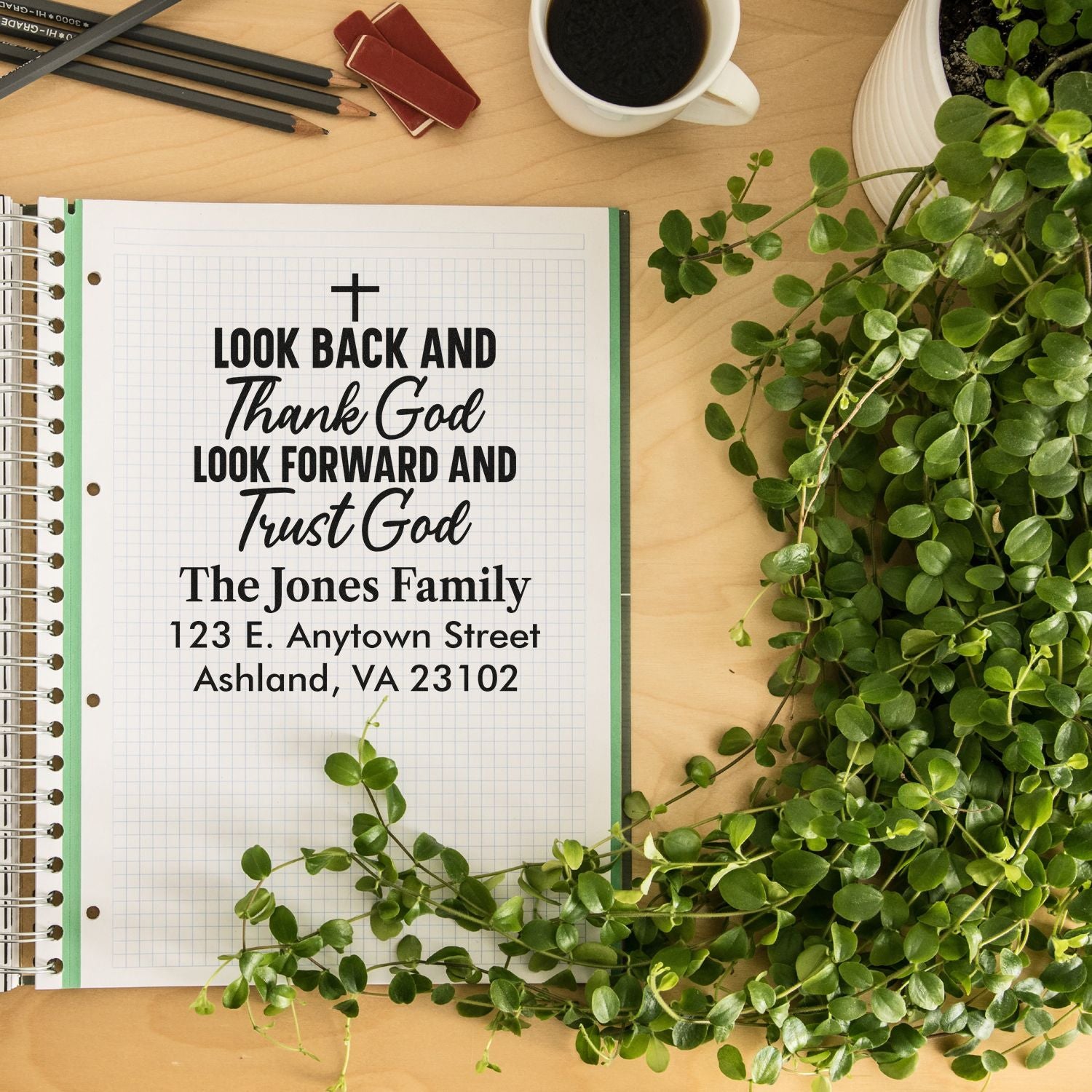 Custom return address rubber stamp mockup with Christian quote, family name, and address for personalized stationery.