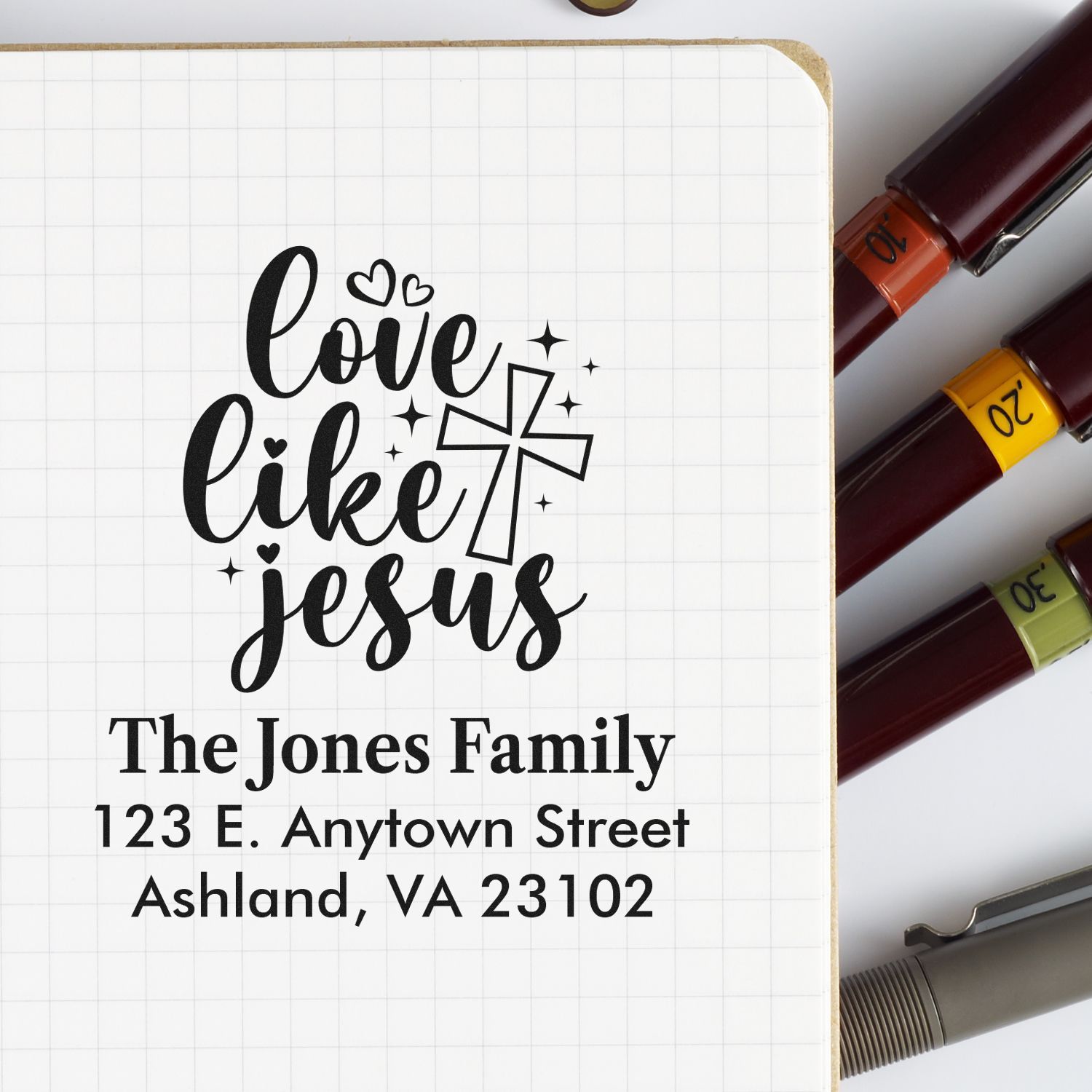 Custom rubber stamp with Love Like Jesus design and The Jones Family return address, Ashland, VA.