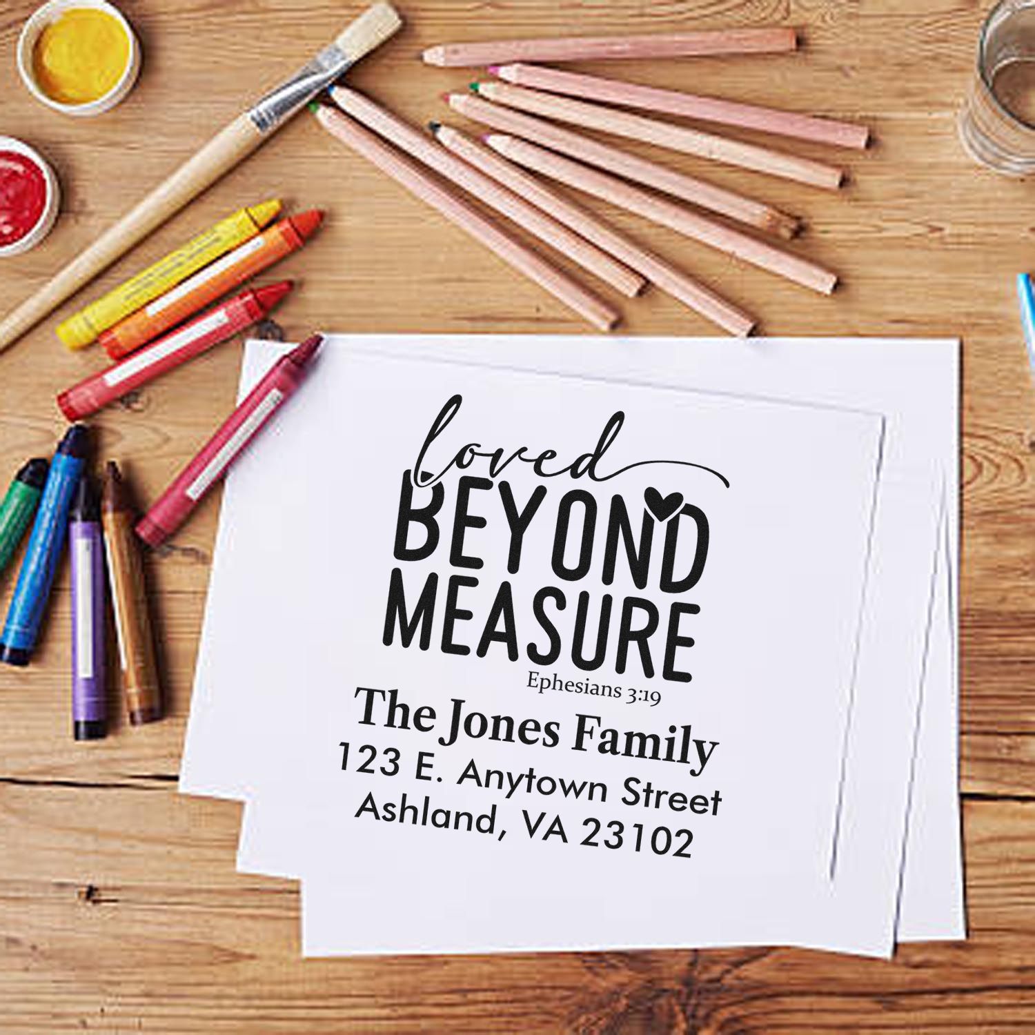 Custom family address rubber stamp with Loved Beyond Measure Bible verse, perfect for personalized Christian stationery and mail.