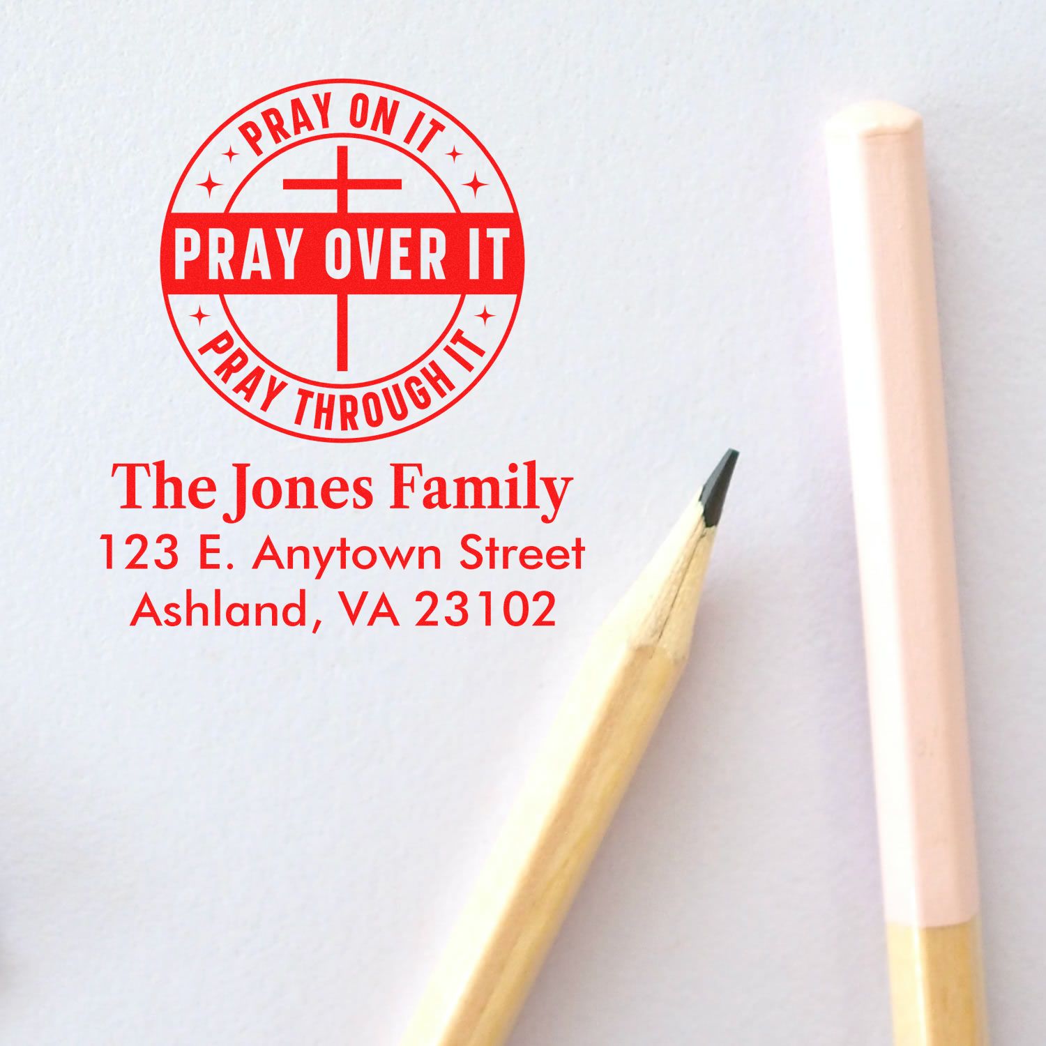 Custom rubber stamp with Christian Pray Over It design and return address for The Jones Family.