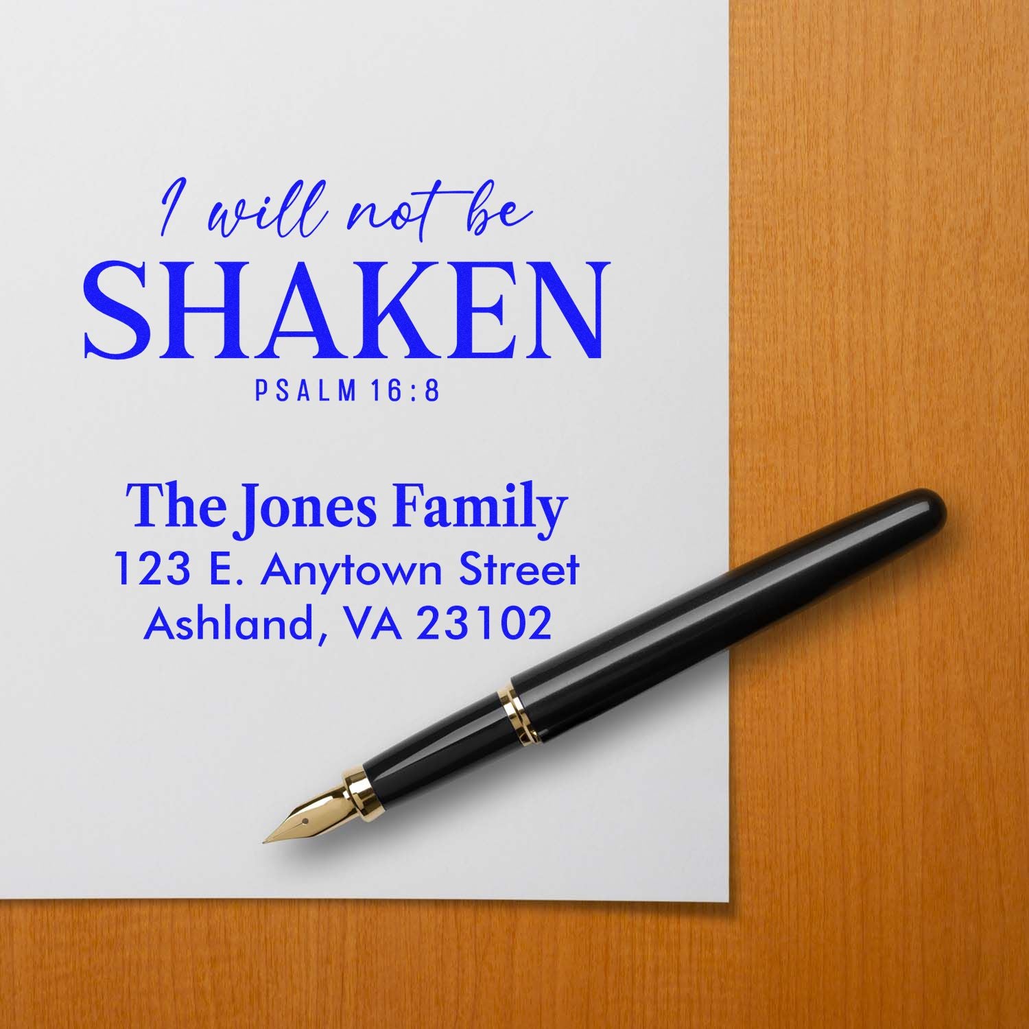 Custom rubber stamp mockup with Psalm 16:8, I will not be shaken, and personalized family address for stationery.