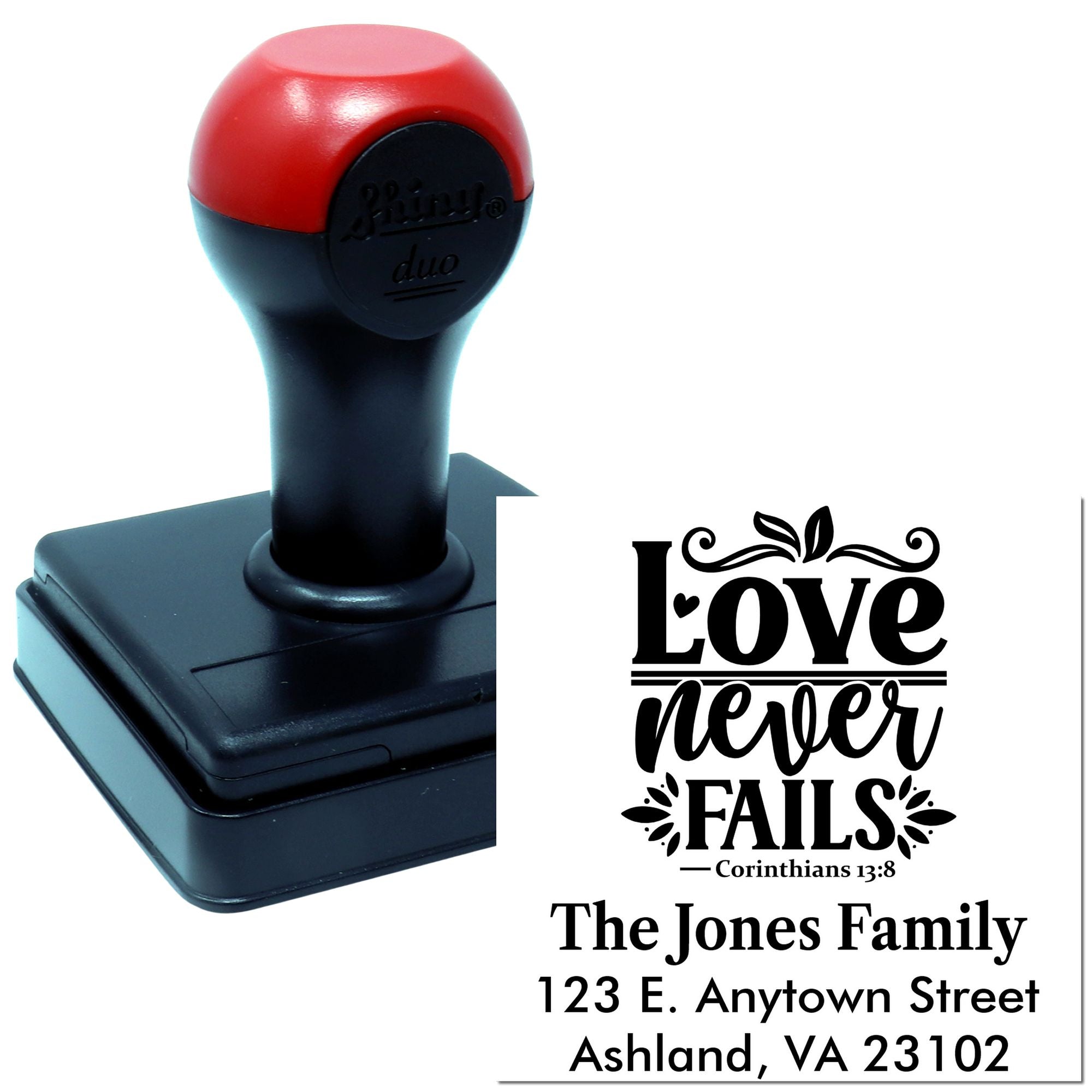 Custom self-inking rubber stamp with Love never fails Bible verse and family return address imprint.