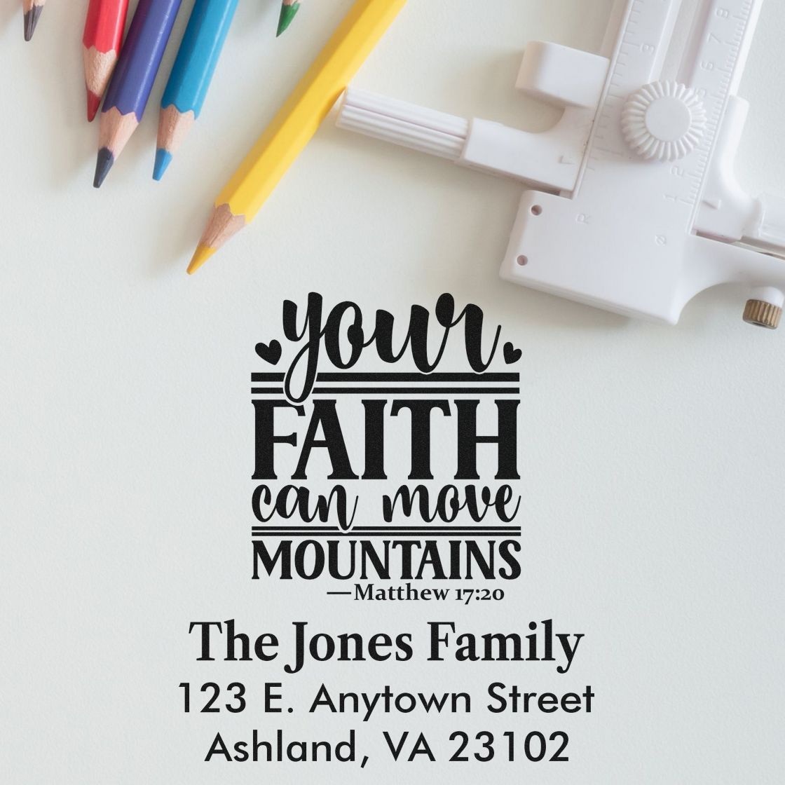Custom return address rubber stamp featuring Your faith can move mountains scripture and The Jones Family address.
