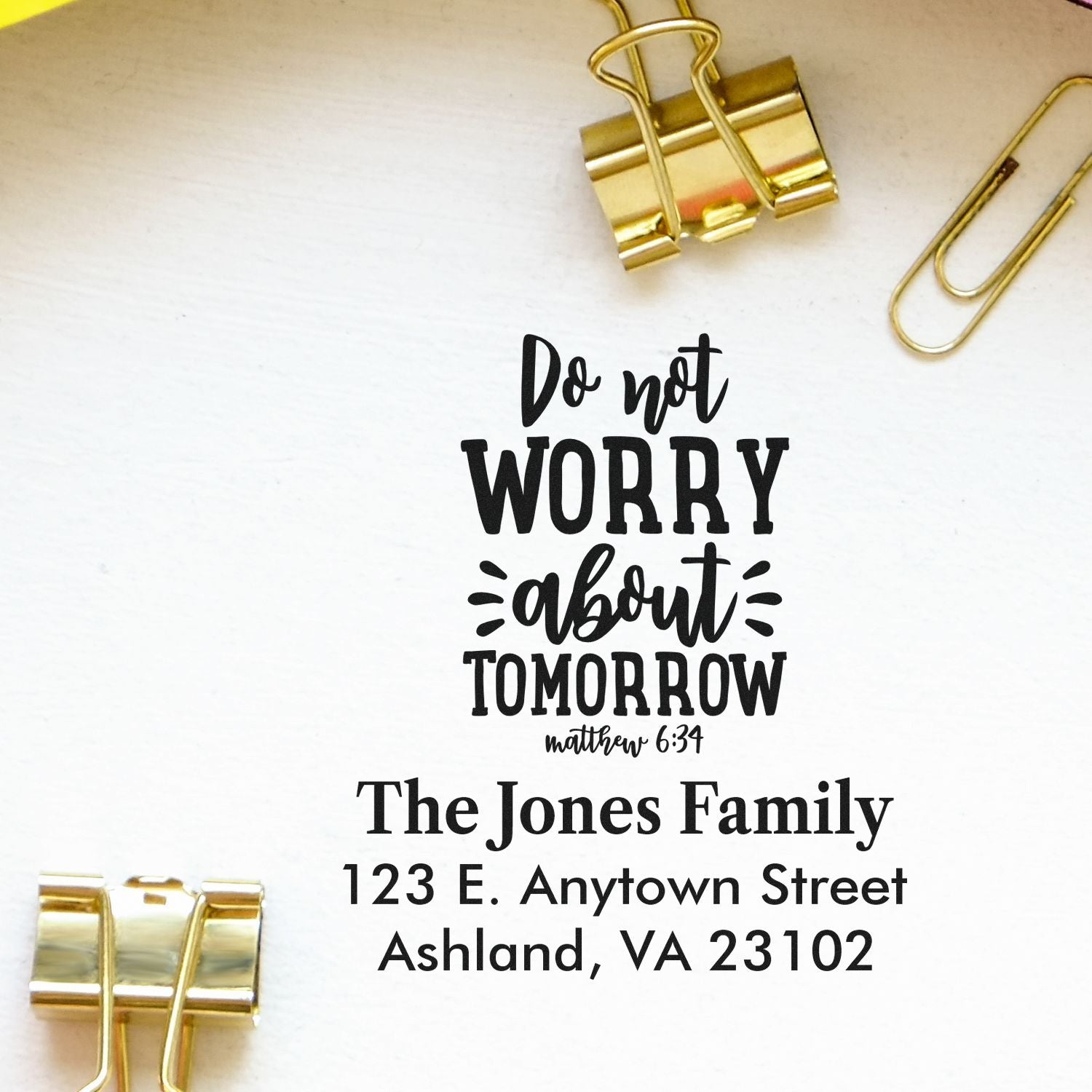 Personalized rubber stamp with Matthew 6:34 quote, family name, and return address for custom stationery.