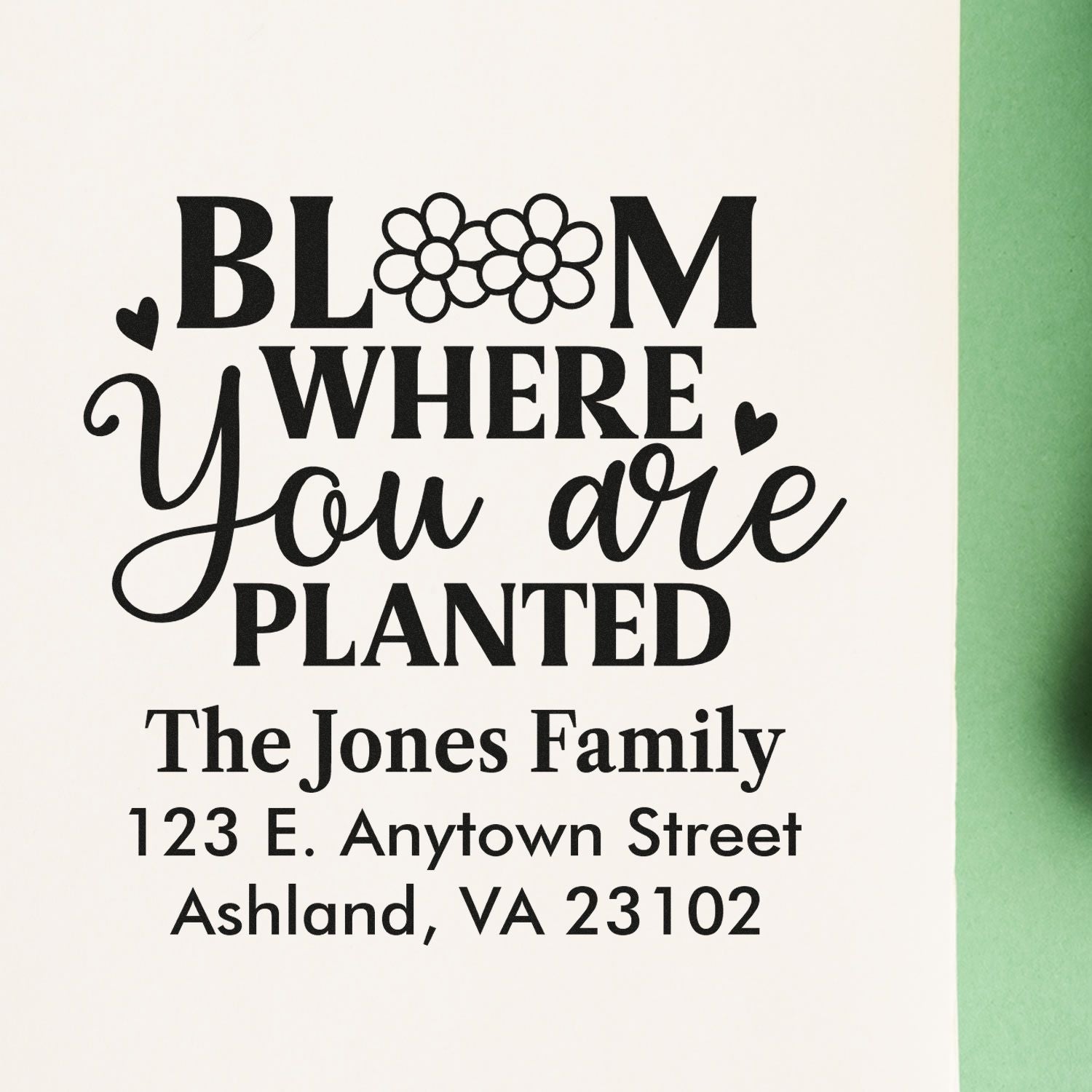 Personalized rubber stamp with Bloom where you are planted and custom family name and address.