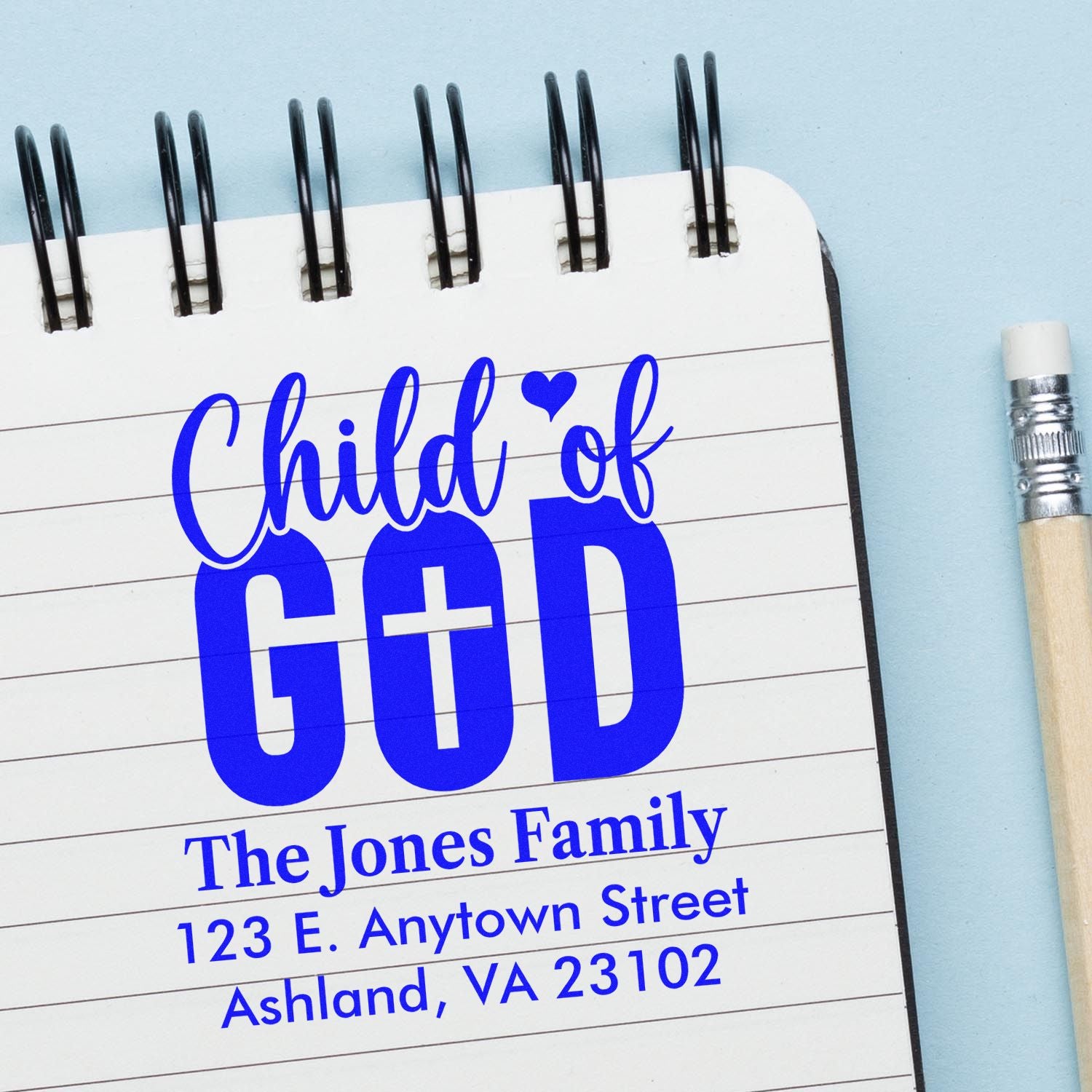 Custom personalized faith-based rubber stamp design reading Child of God with family name and address.