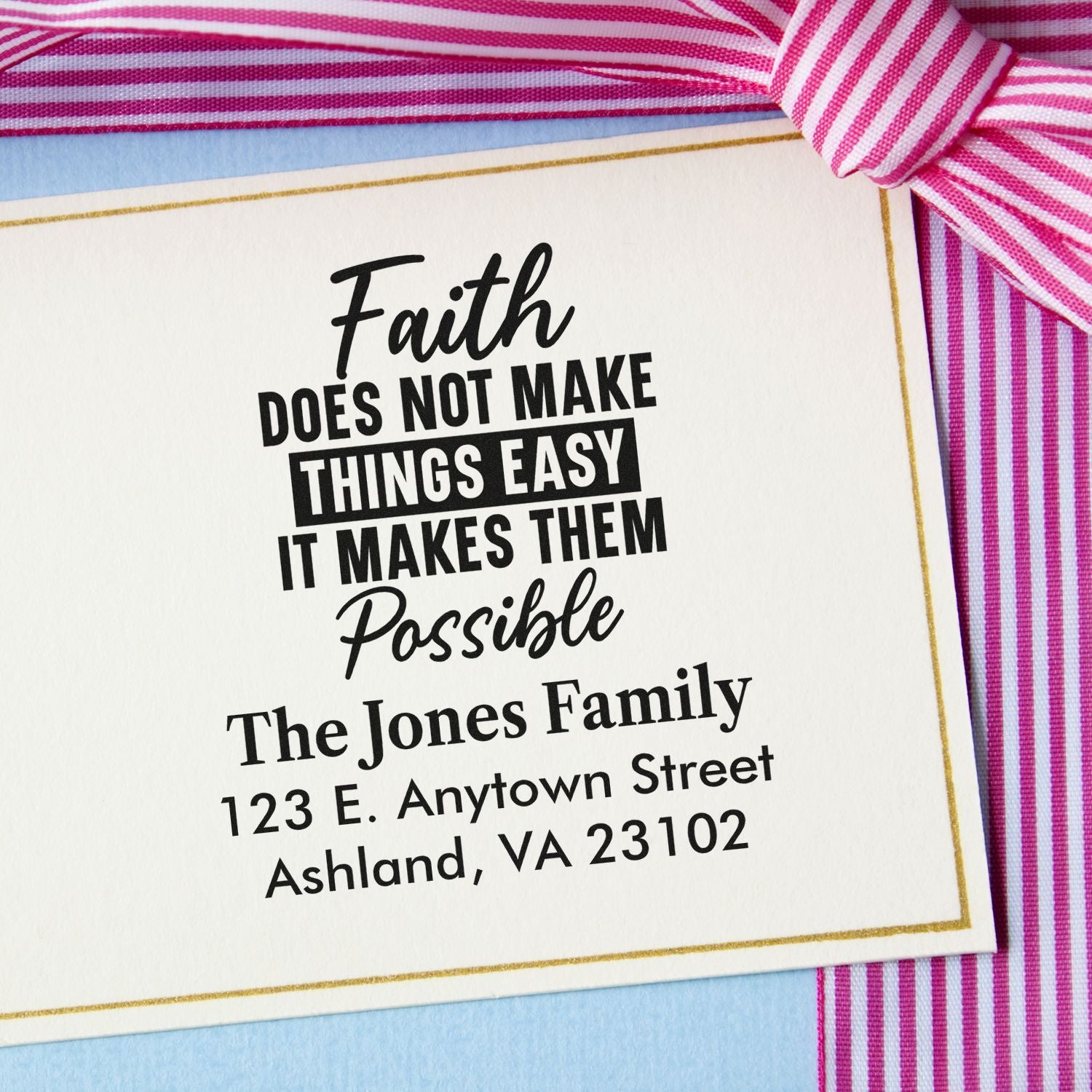 Custom return address stamp impression with faith quote and personalized family name on a gift card