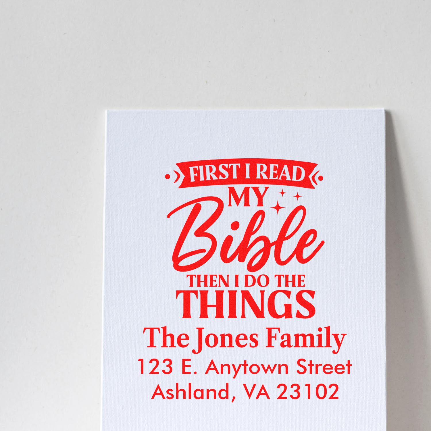 Custom rubber stamp with Bible quote and personalized family address for The Jones Family, Ashland, VA 23102.